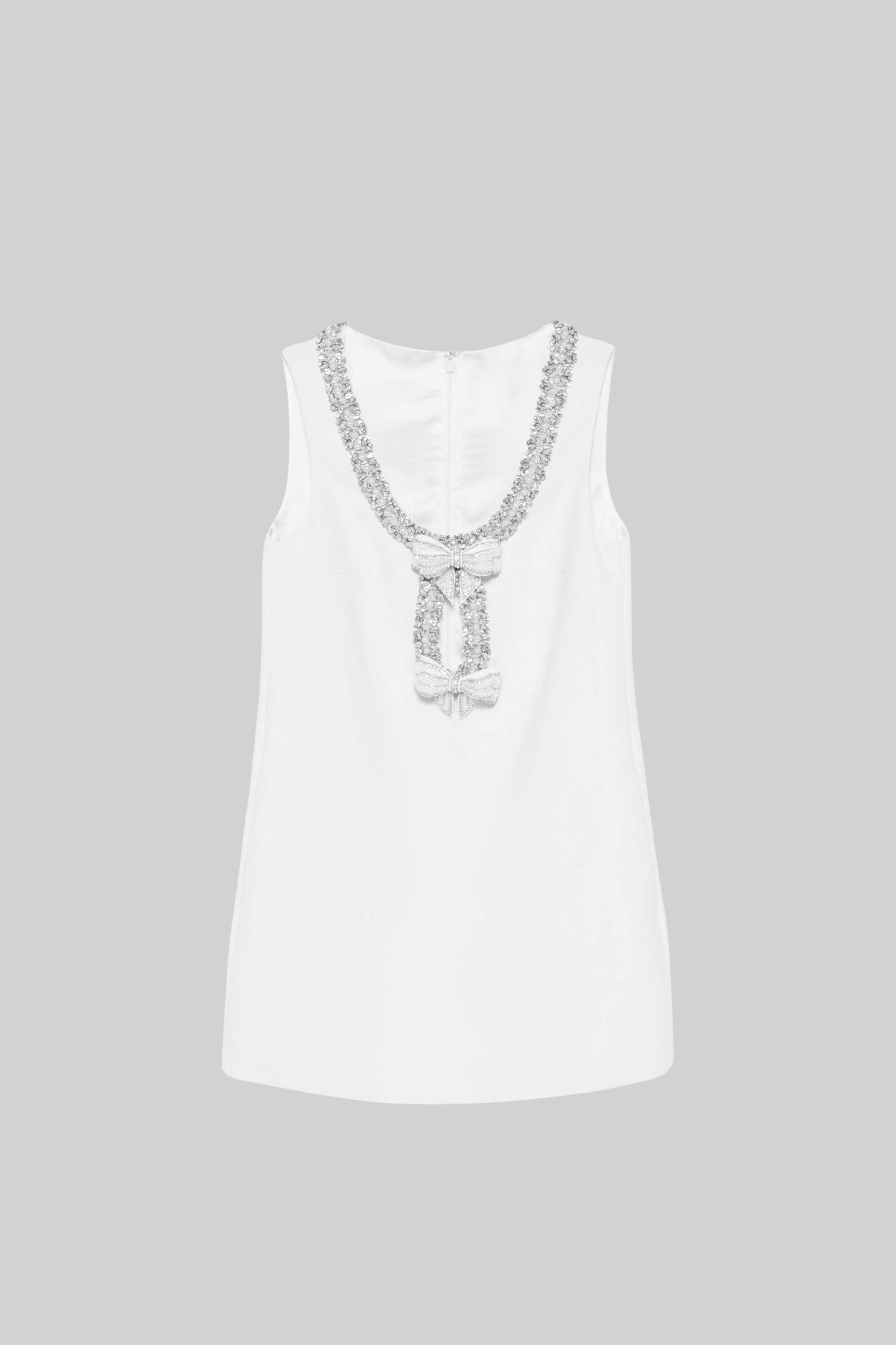 Sleeveless Mini Dress With Intricate Sparkling Neckline And Bow Embellishments - White