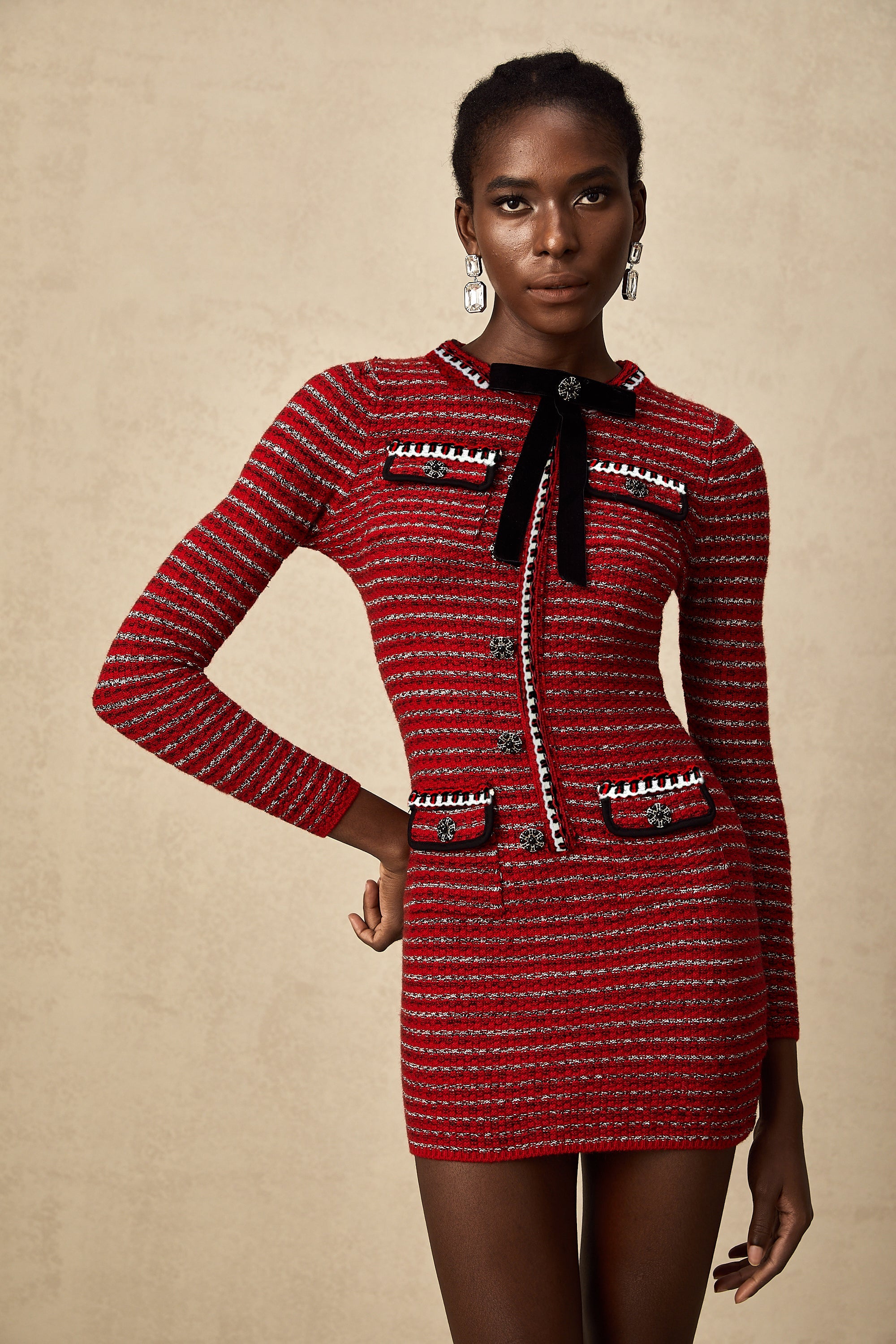 Faustine bow-detailed knit mini dress
