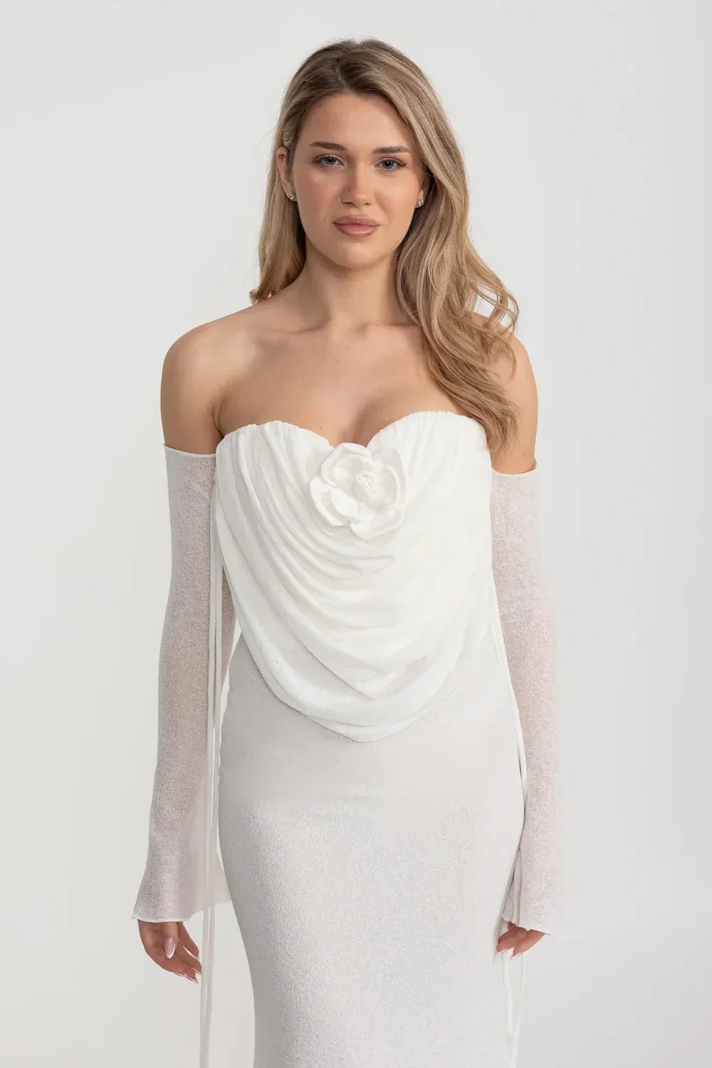 Elegant Flowing Dress With Long Sleeves, Top Draping And Central Rose Adornment - White
