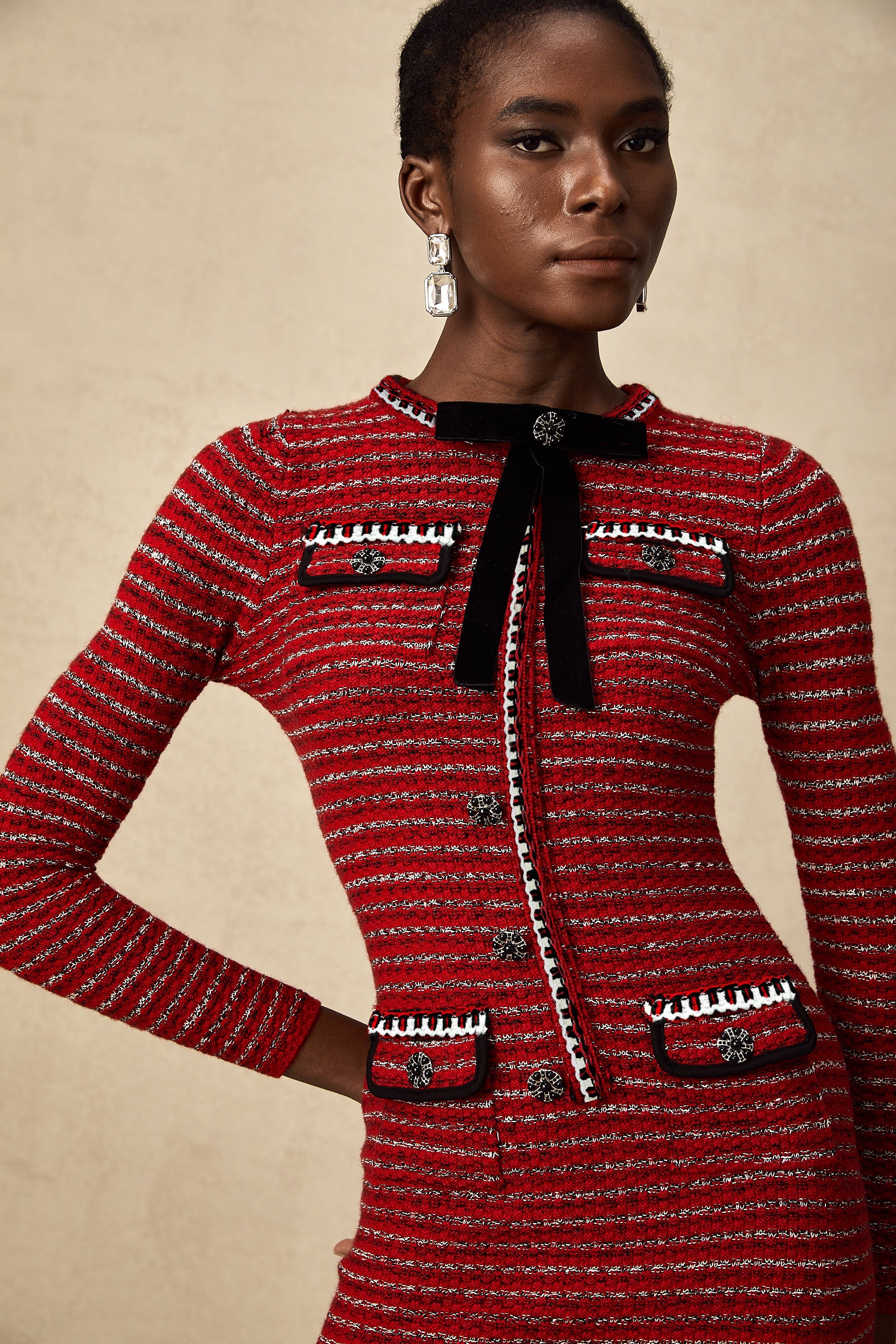 Faustine bow-detailed knit mini dress