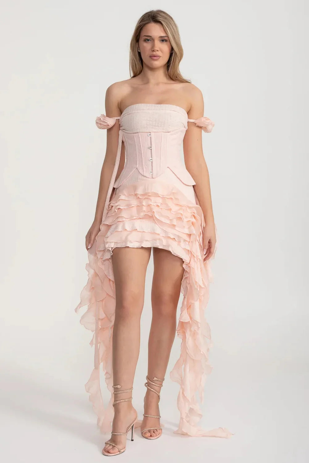 Vintage Inspired Corset Dress With Ruched Bustier And Flowing Ruffled Side Details - Pink