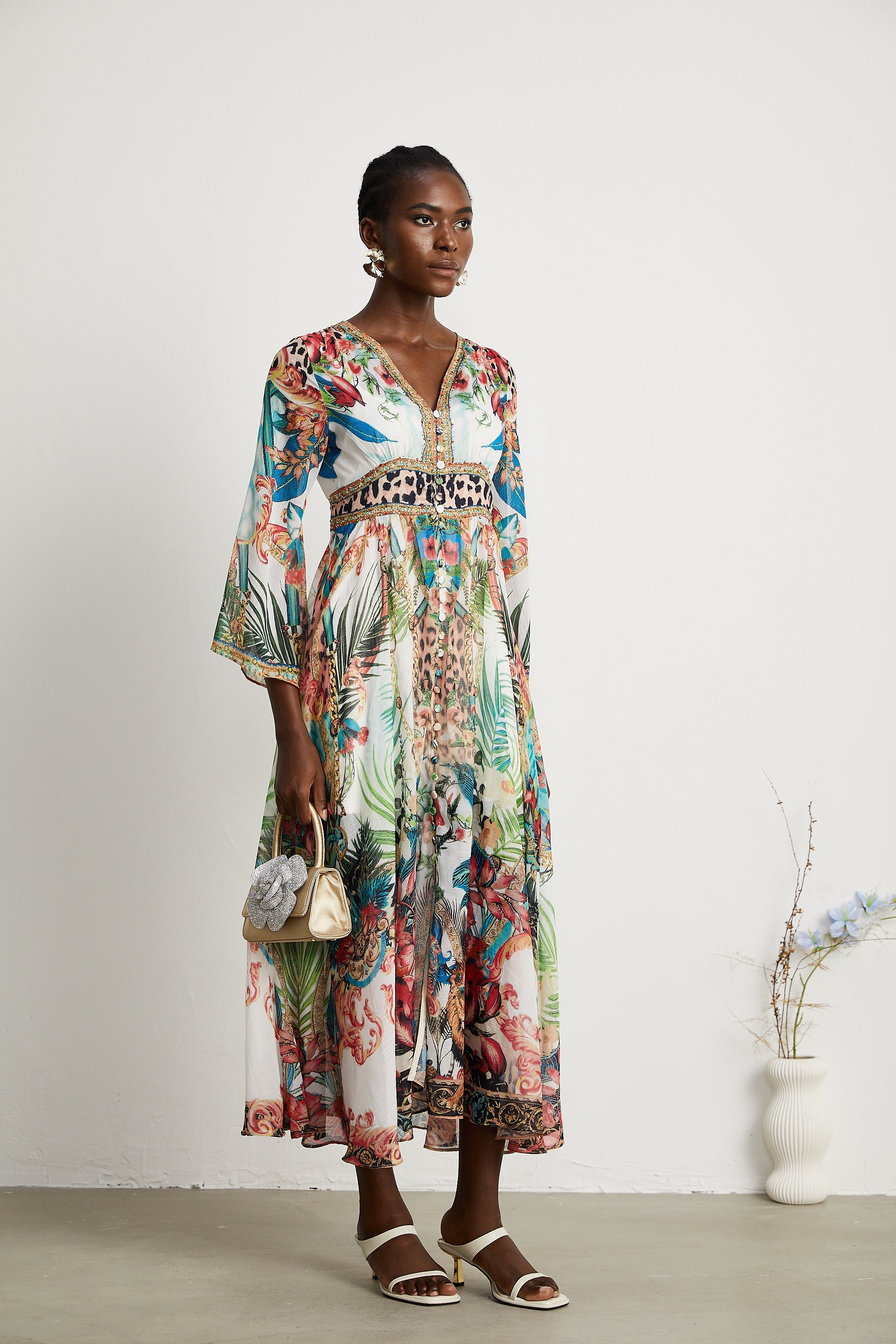 Éva pattern-print V-neck midi dress