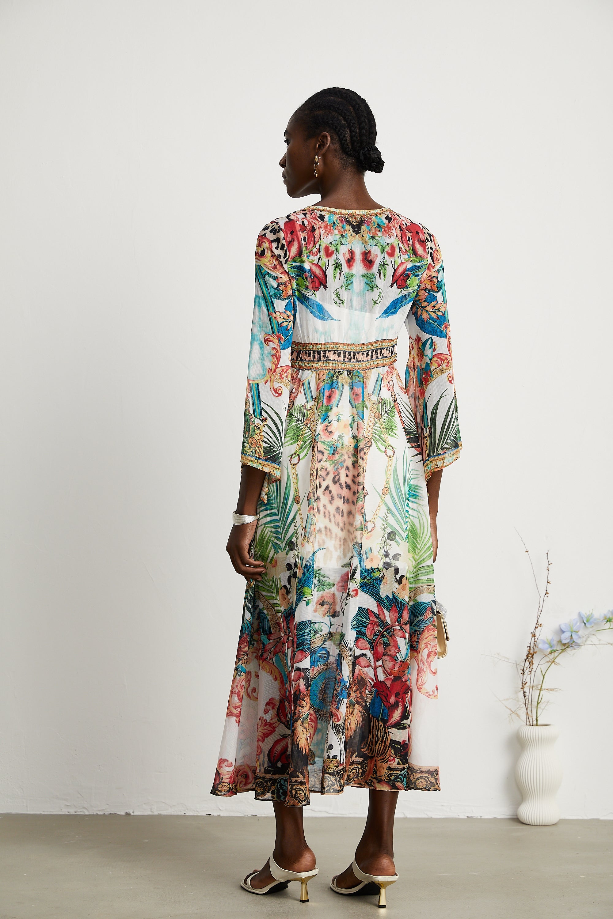 Éva pattern-print V-neck midi dress