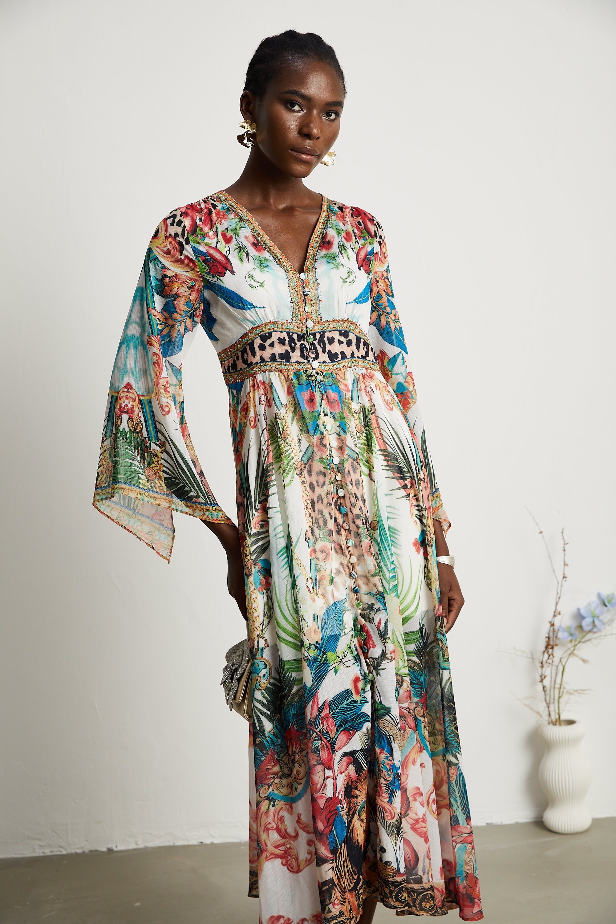 Éva pattern-print V-neck midi dress