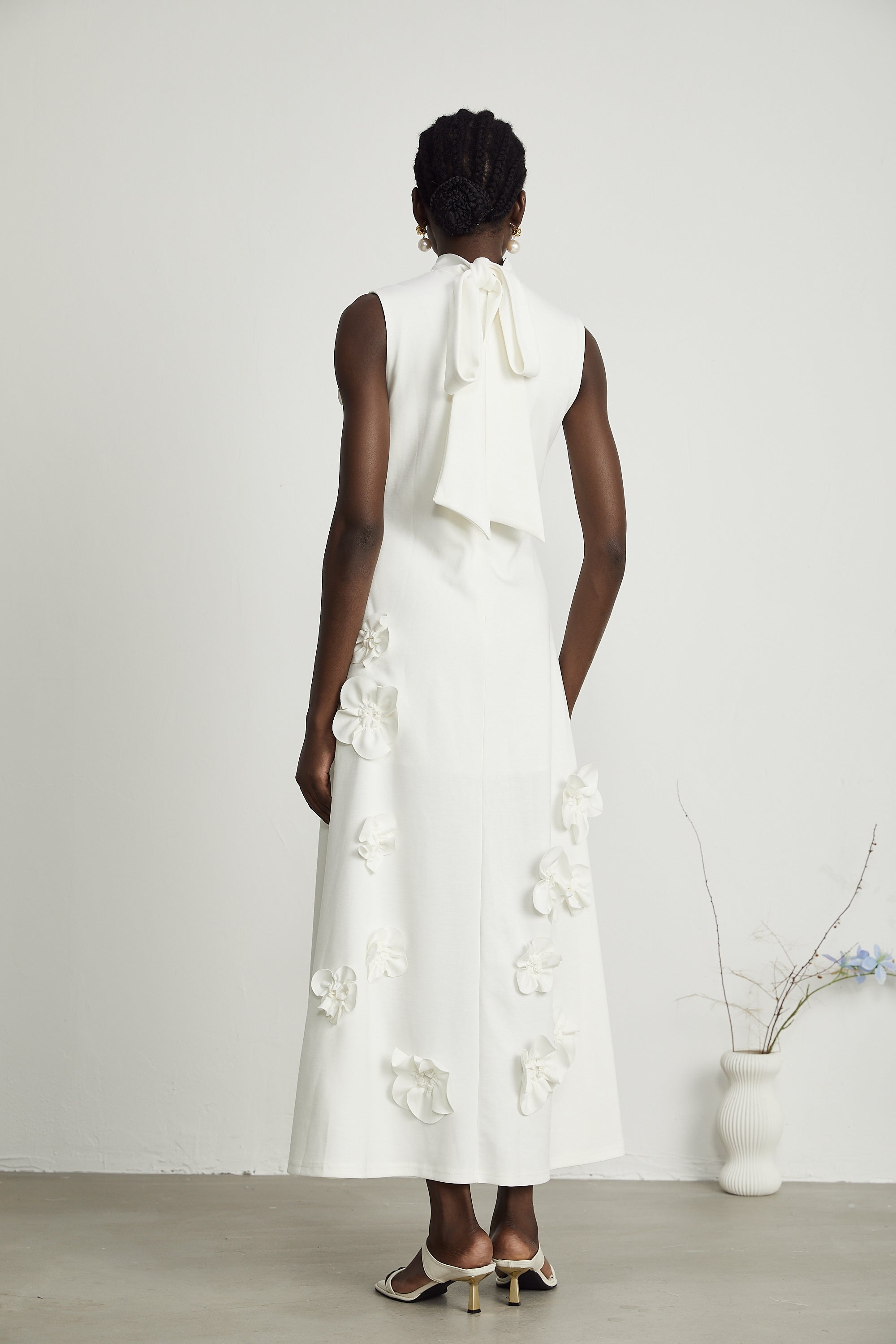 Magali White Sleeveless Maxi Dress with Faux Flower & Bow-Tie Embellishment (Final Sale-US Only)