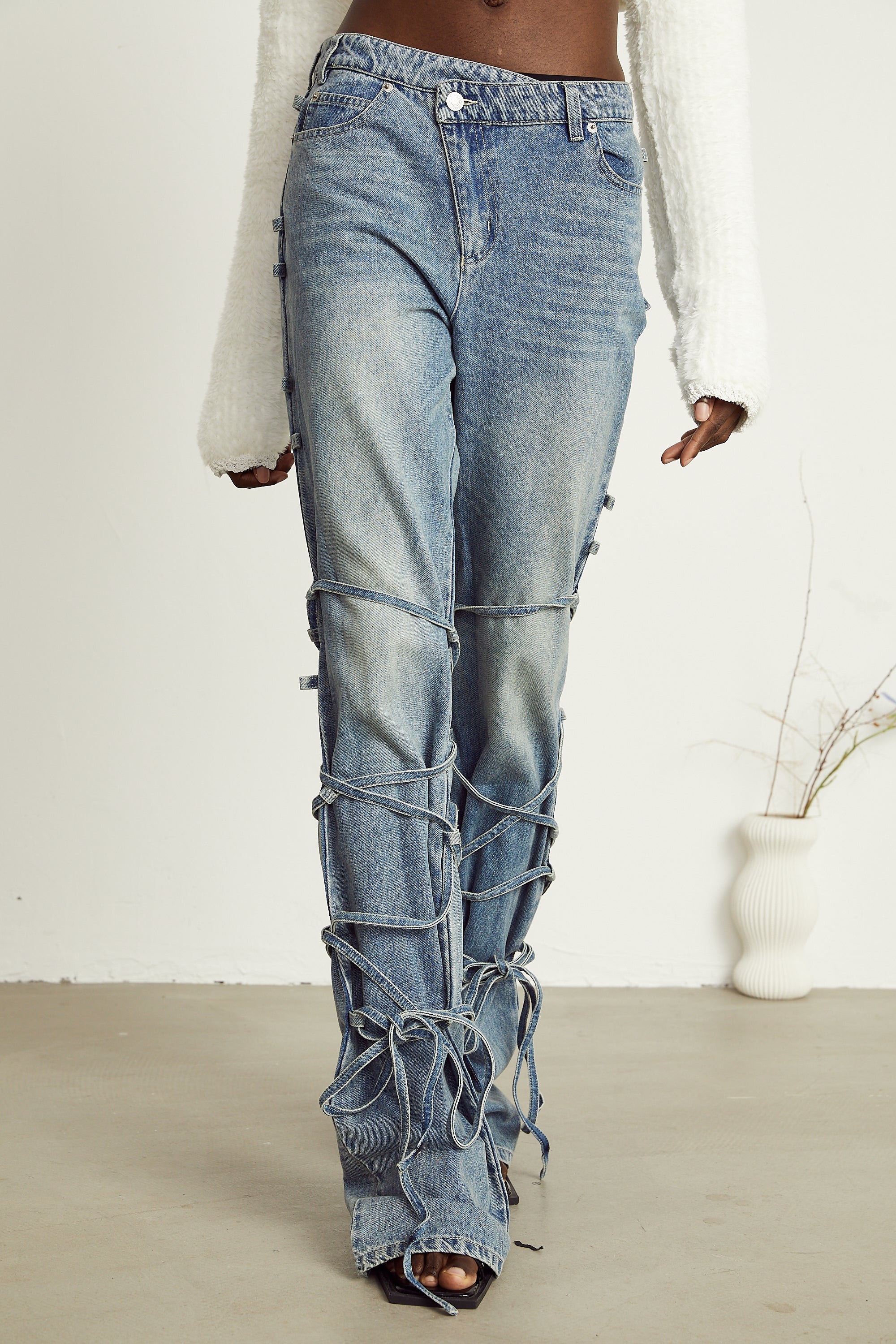 Géraldine strap-detail jeans (Final Sale-US Only)