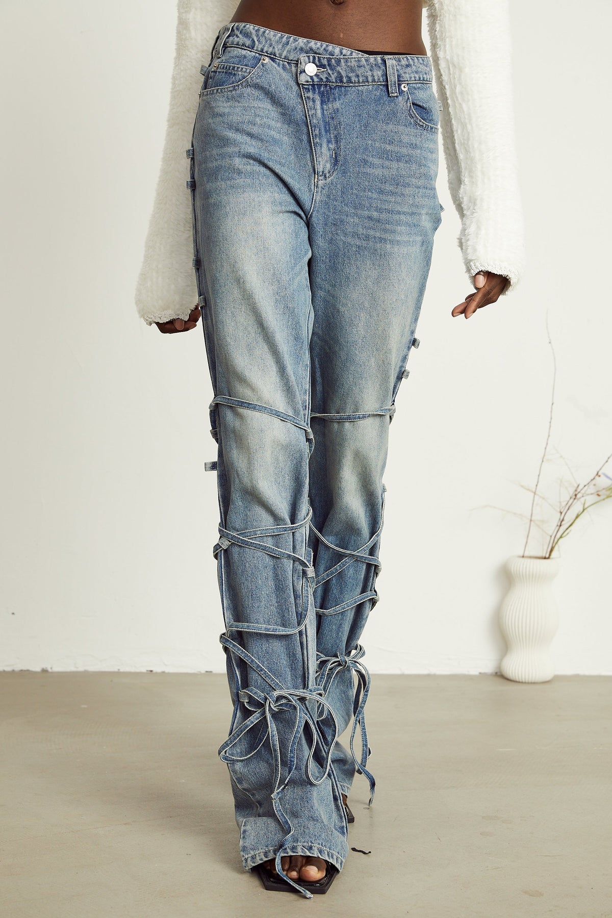Géraldine strap-detail jeans (Final Sale-US Only)