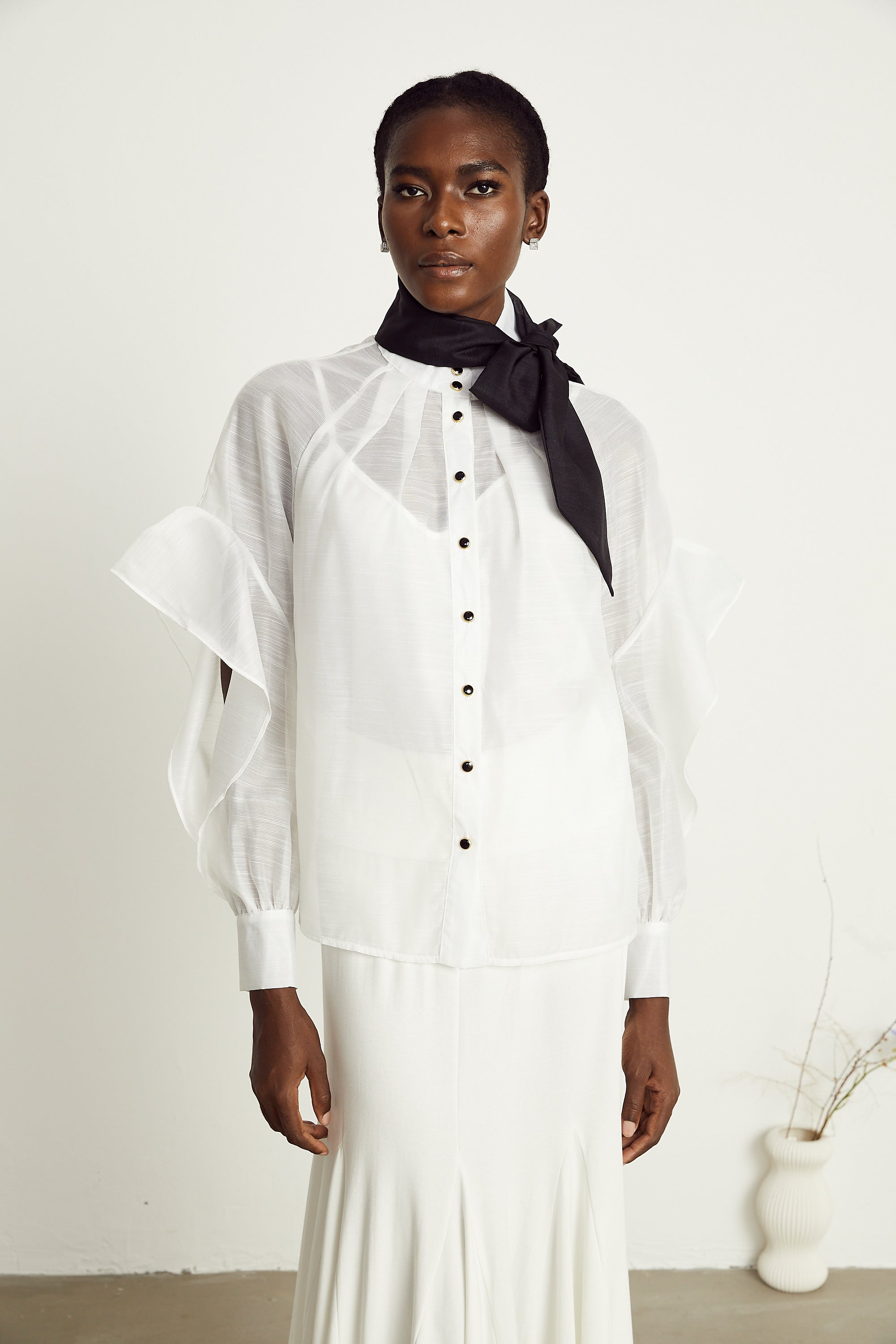 Margaux white semi-sheer ruffled bow-tie shirt