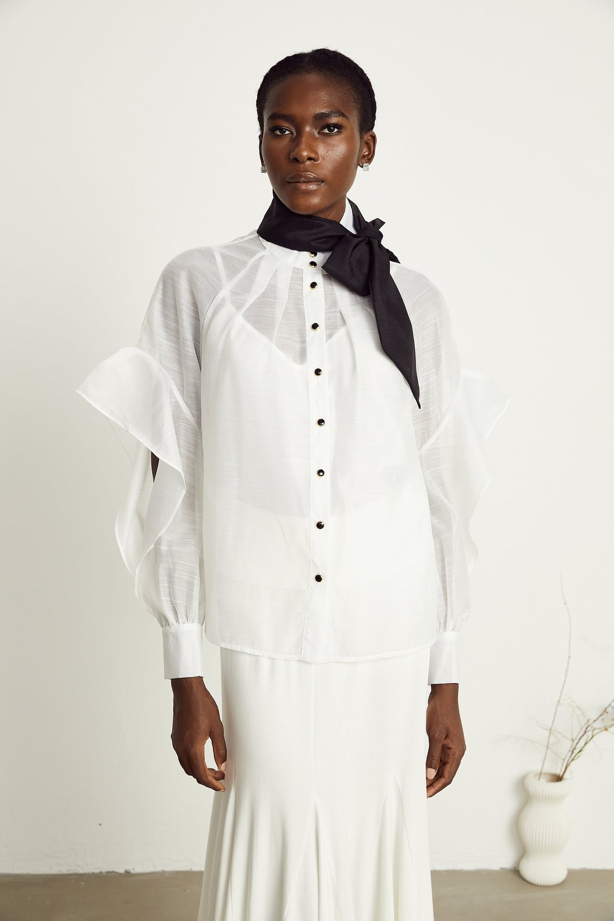 Margaux white semi-sheer ruffled bow-tie shirt