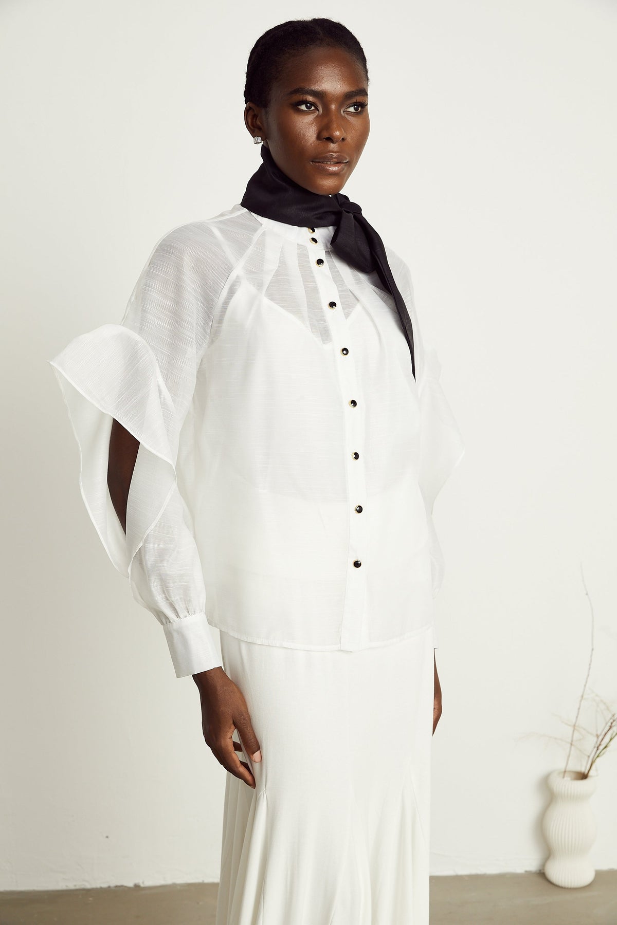 Margaux white semi-sheer ruffled bow-tie shirt
