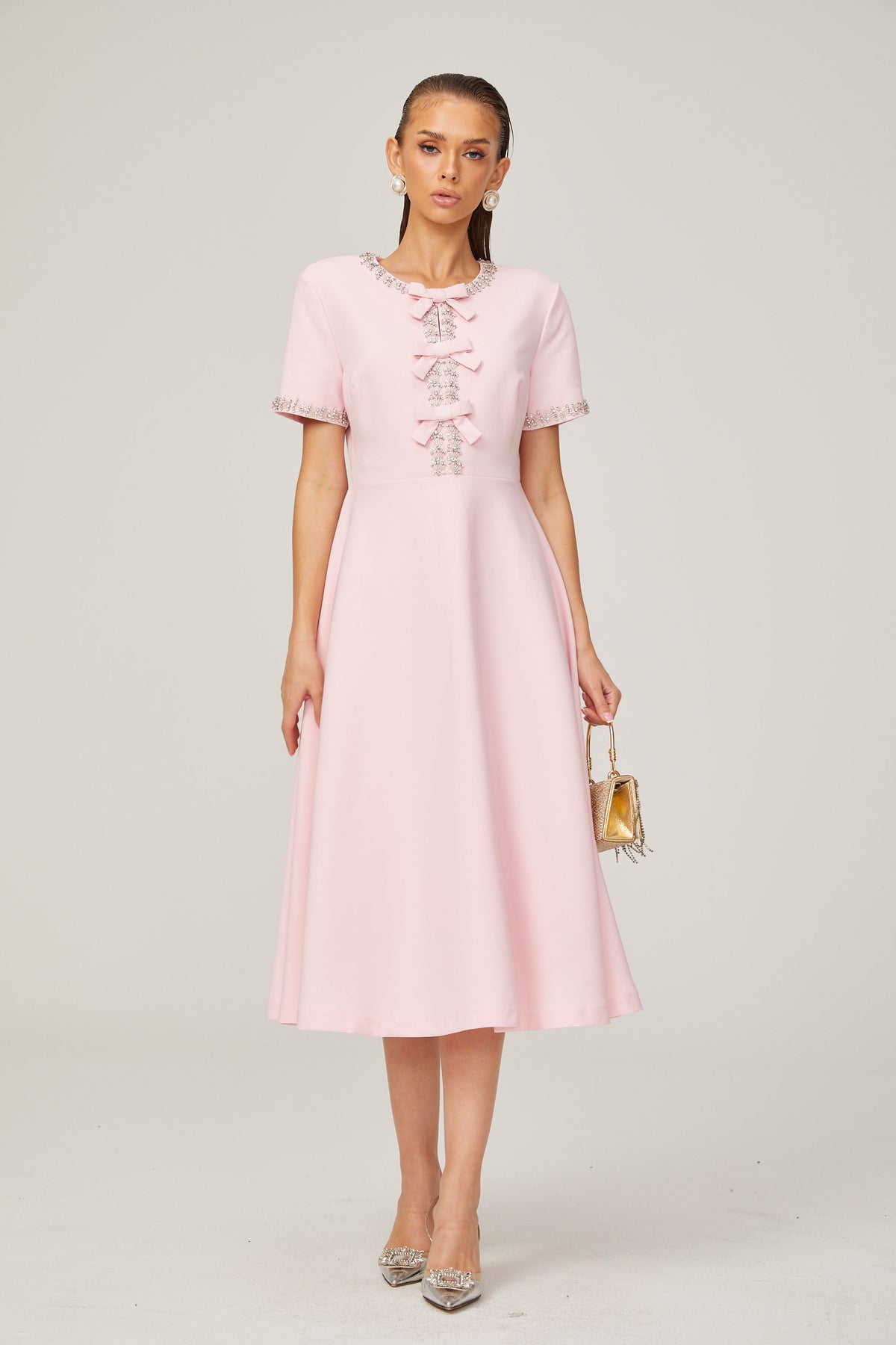 Cassiopeia crystal-accented pink bow midi dress