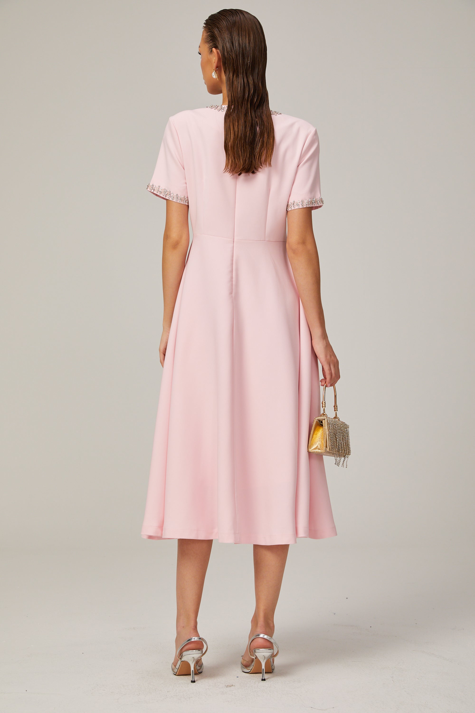 Cassi crystal-accented pink bow midi dress