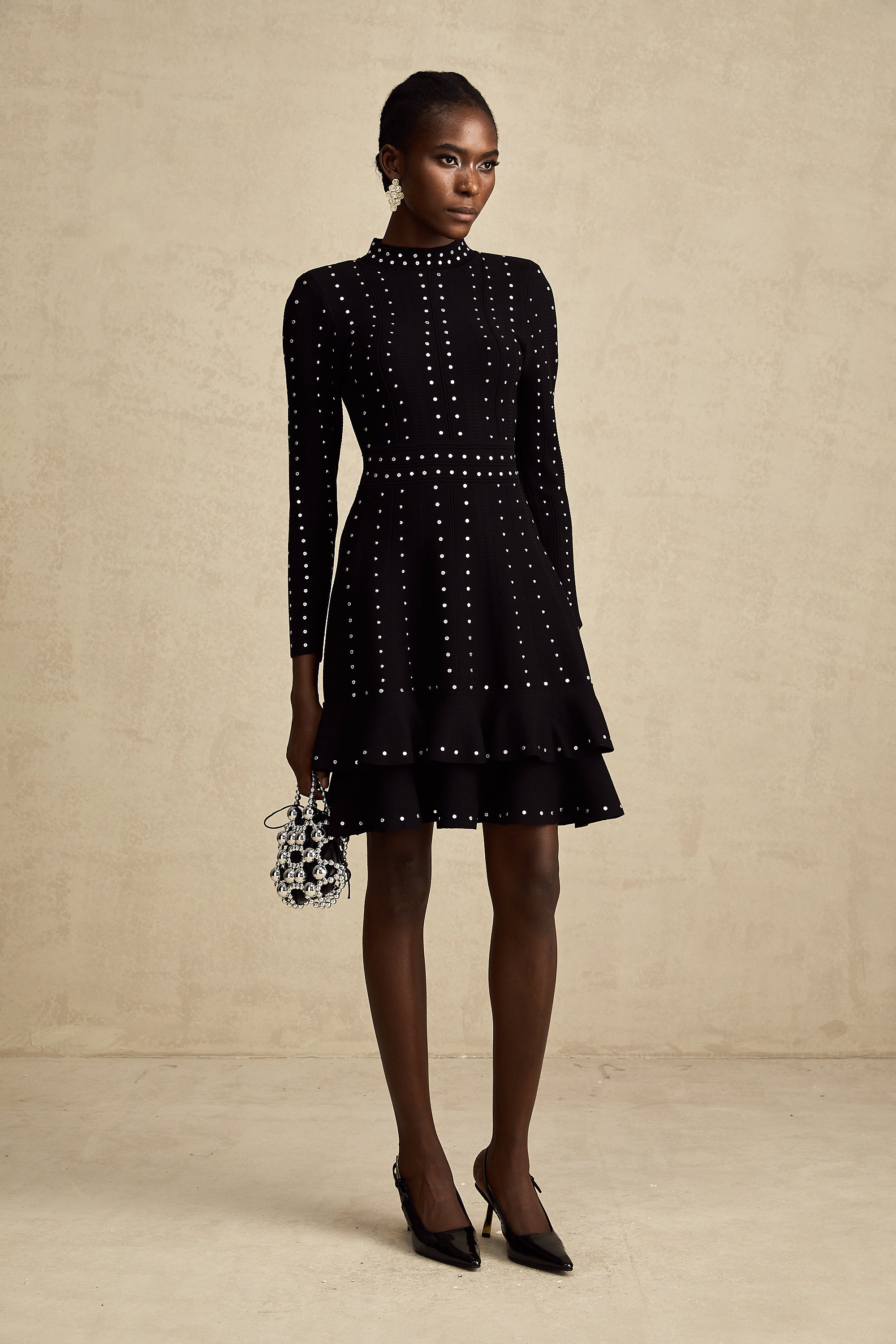 Fabienne black embellished ruffled knitted mini dress