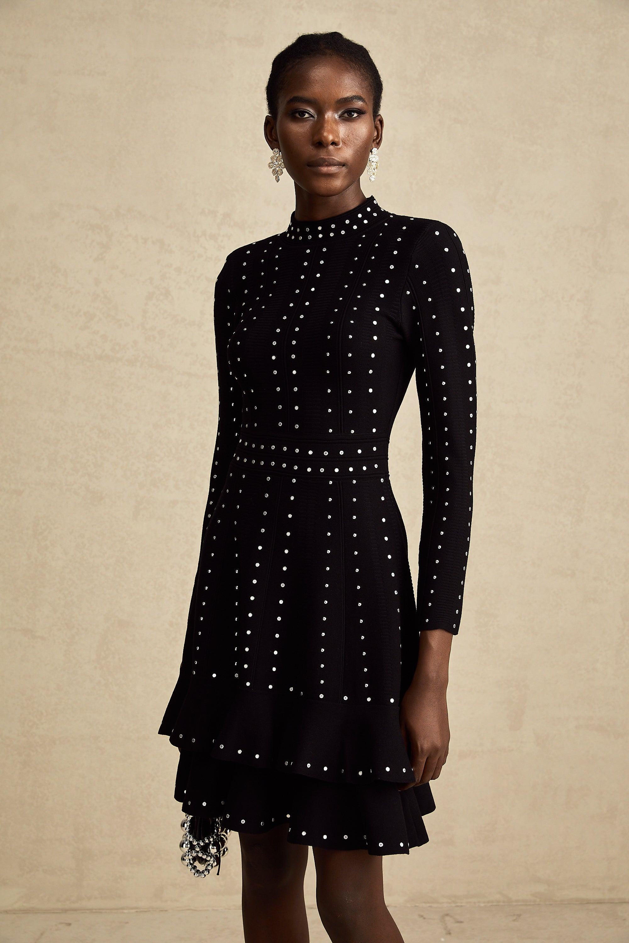 Fabienne black embellished ruffled knitted mini dress