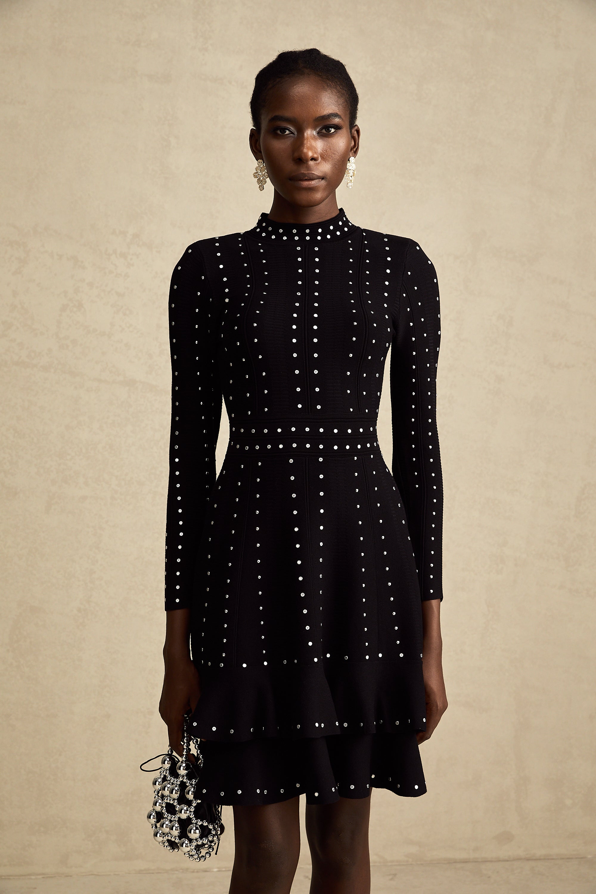 Fabienne black embellished ruffled knitted mini dress