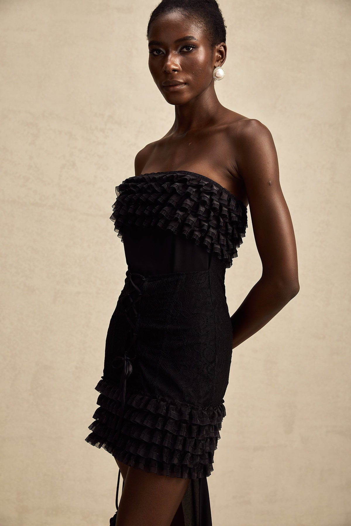 Michèle black ruffled train-design mini dress
