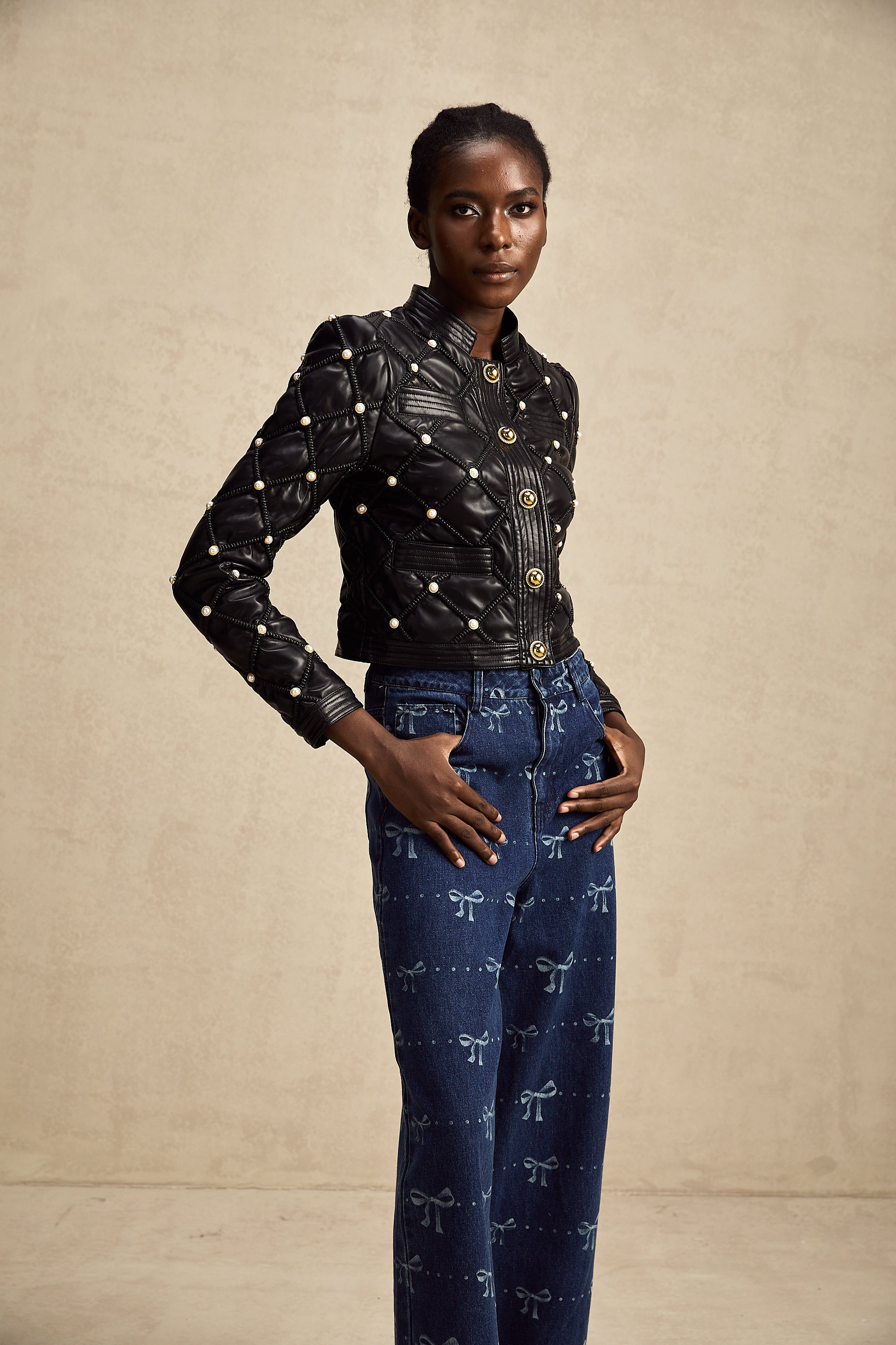 Yvonne bow-motif wide-leg jeans