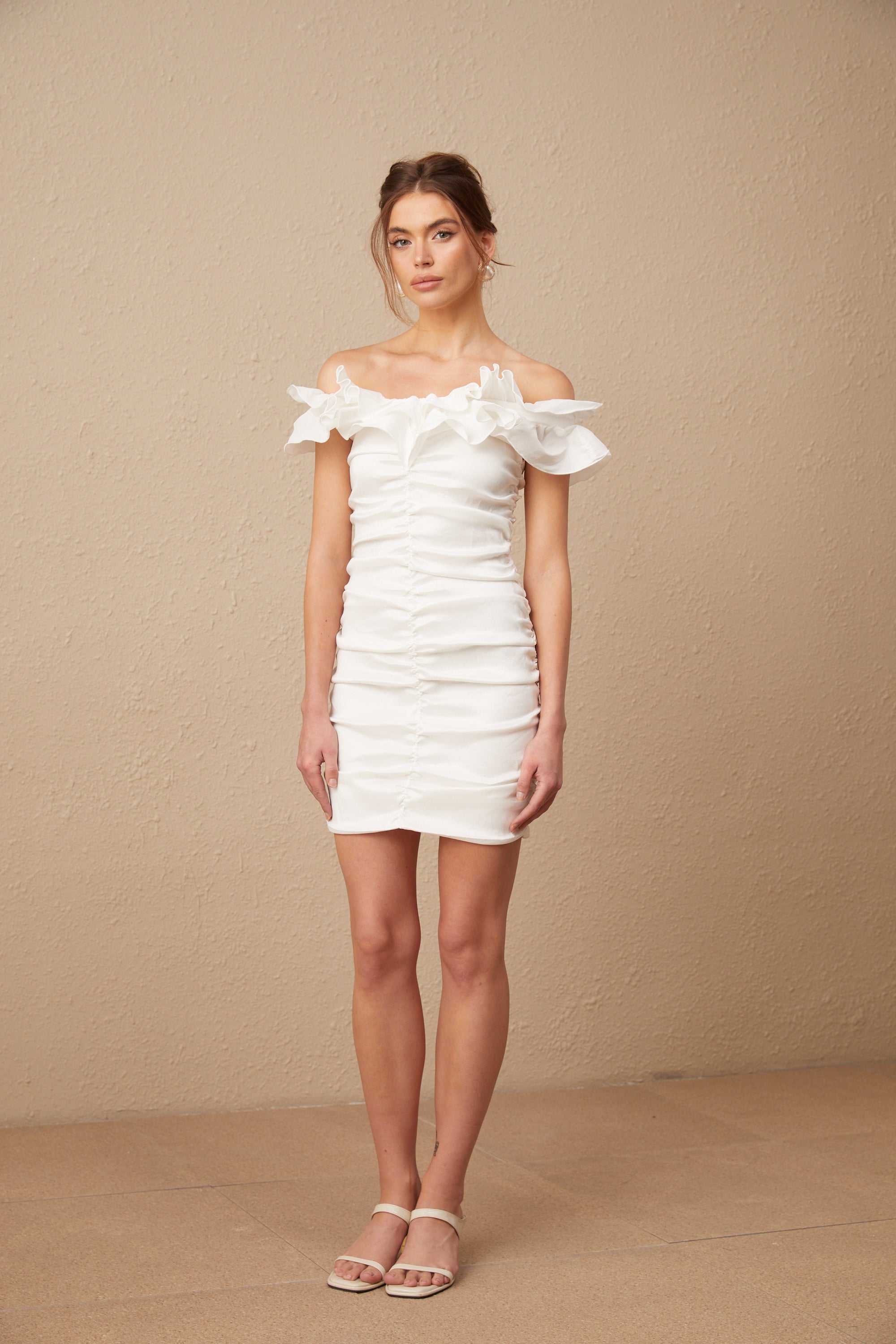 Aïssatou white off-shoulder ruffled mini dress