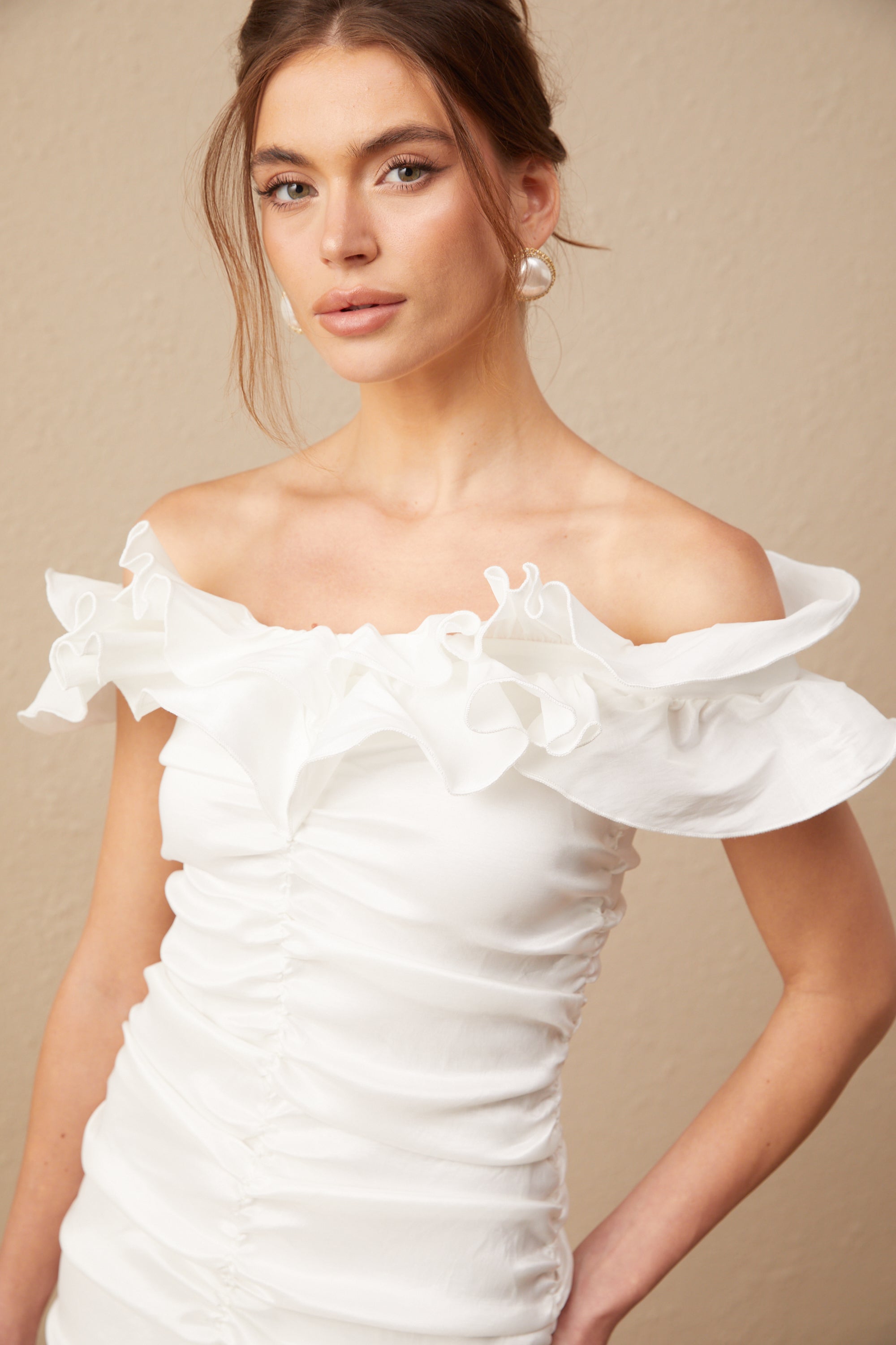 Aïssatou white off-shoulder ruffled mini dress