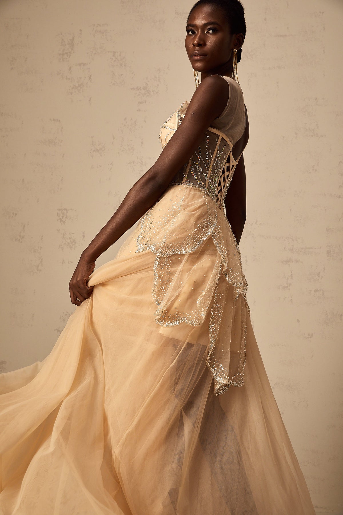 Daisy champagne embellished high-low hem gown