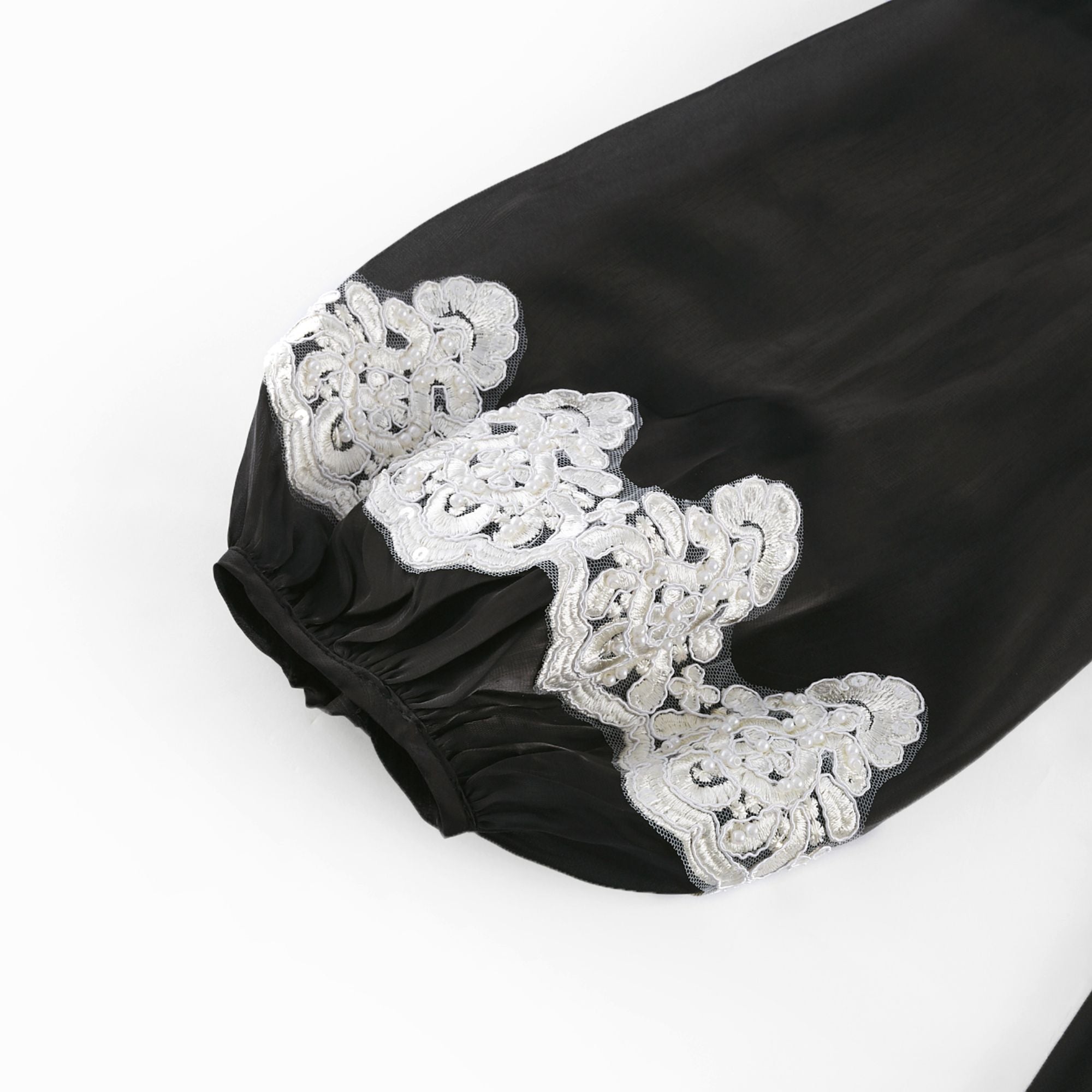 Delphine faux-pearl embellished mini dress in Black (US Only)