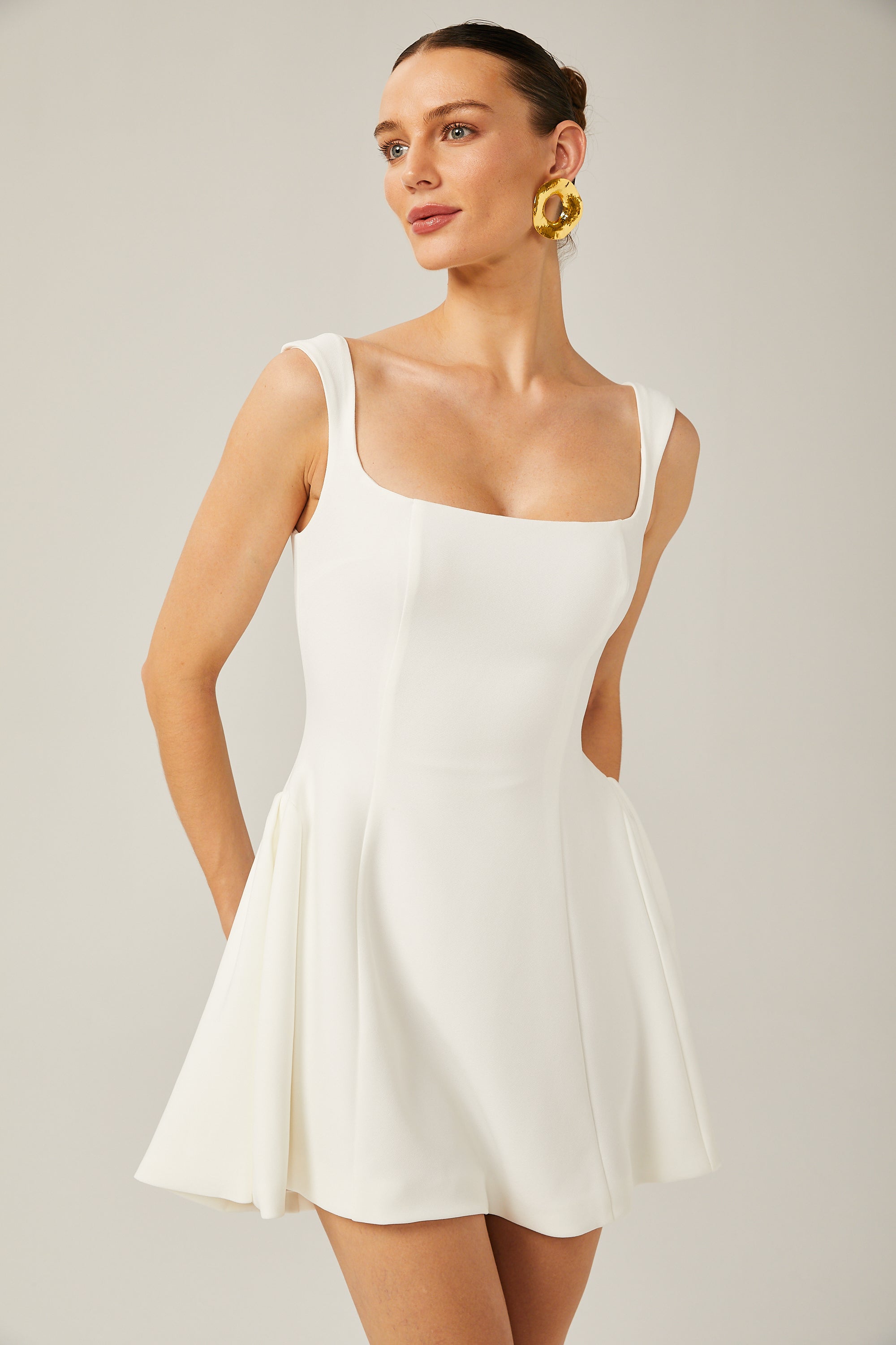 Félicité white sleeveless flared mini dress (US Only)