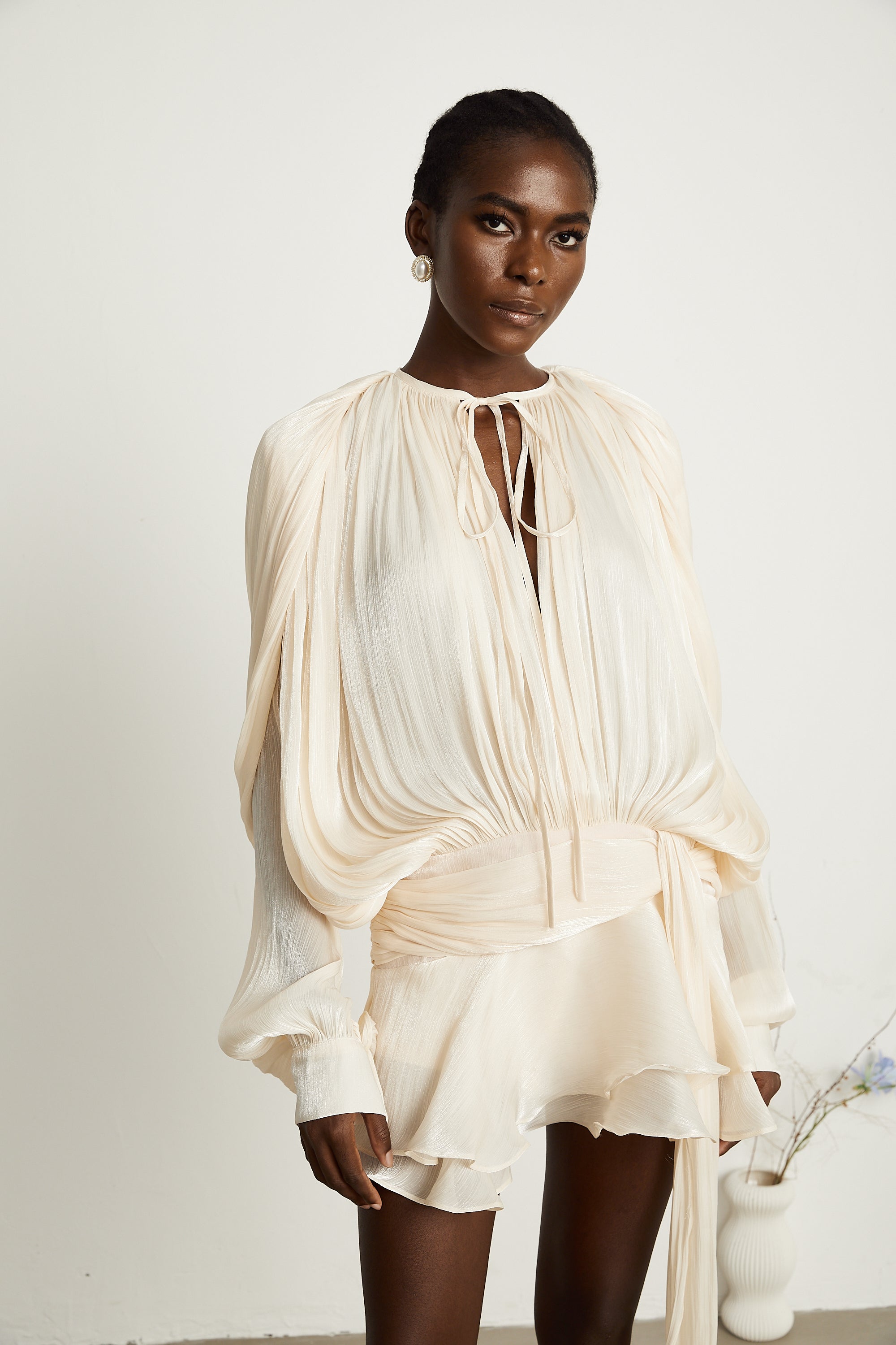 Eugénie fully-pleated ruffled mini dress in Neutrals