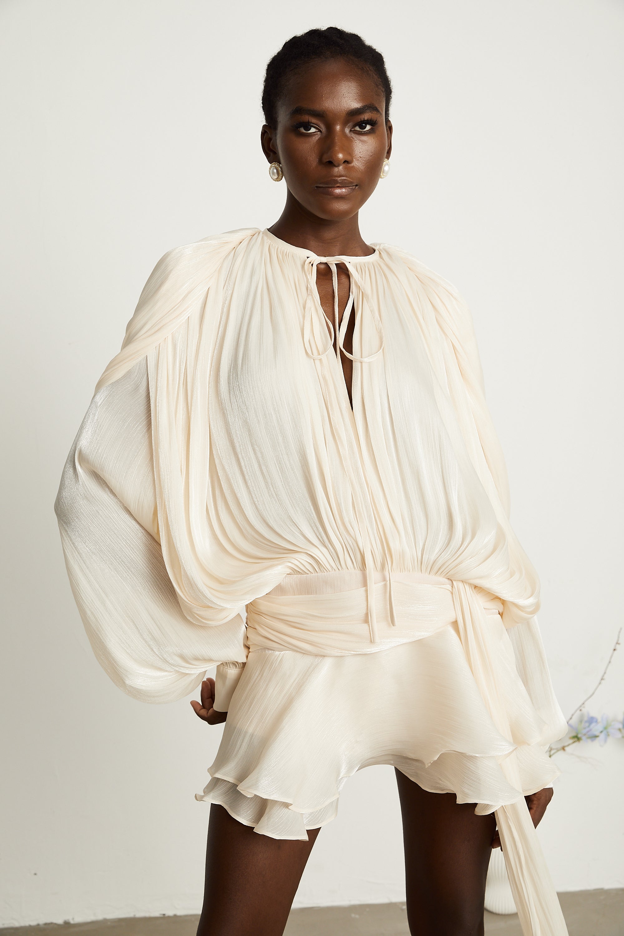 Eugénie fully-pleated ruffled mini dress in Neutrals