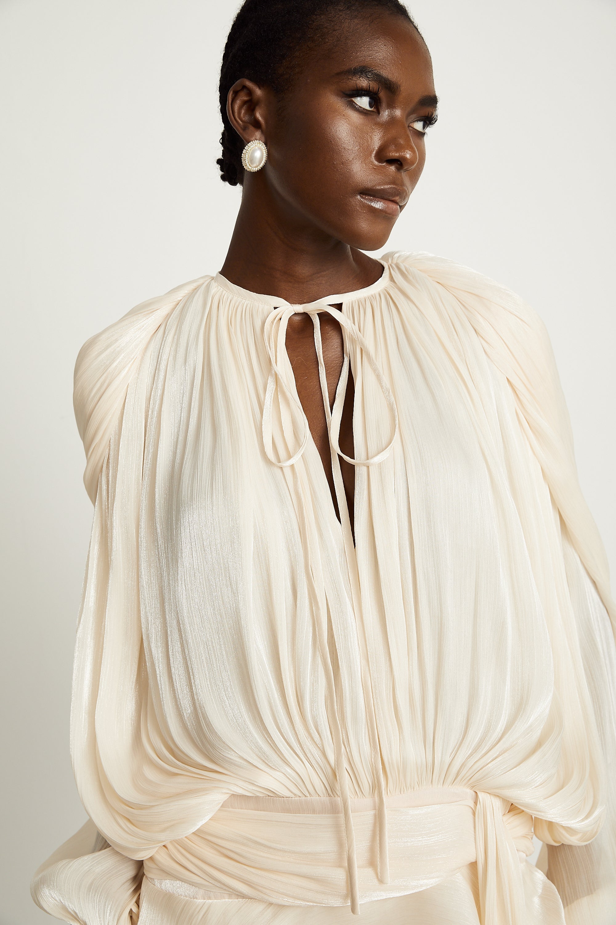 Eugénie fully-pleated ruffled mini dress in Neutrals