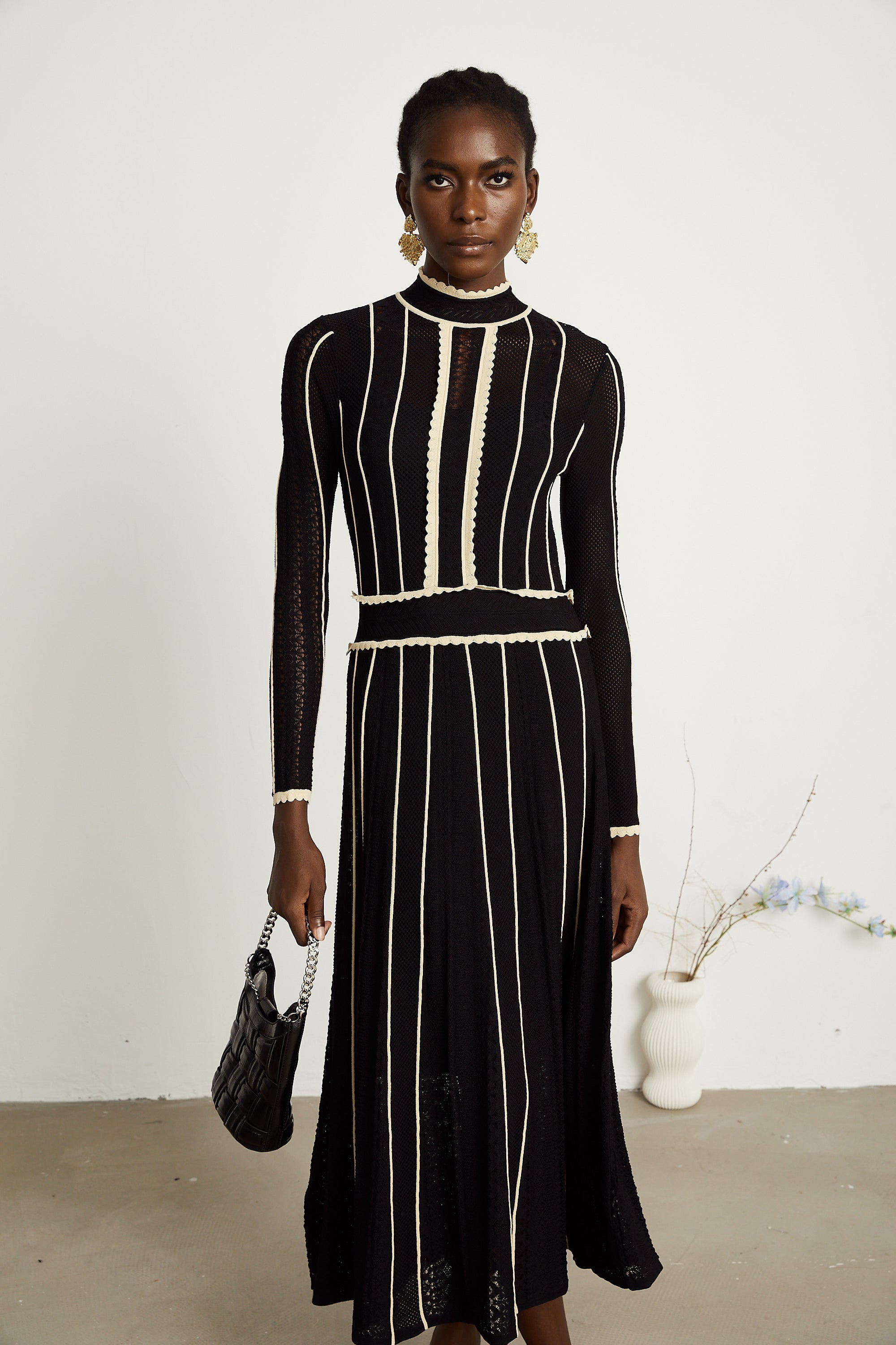 Maëlys black vertical-stripe netted maxi dress