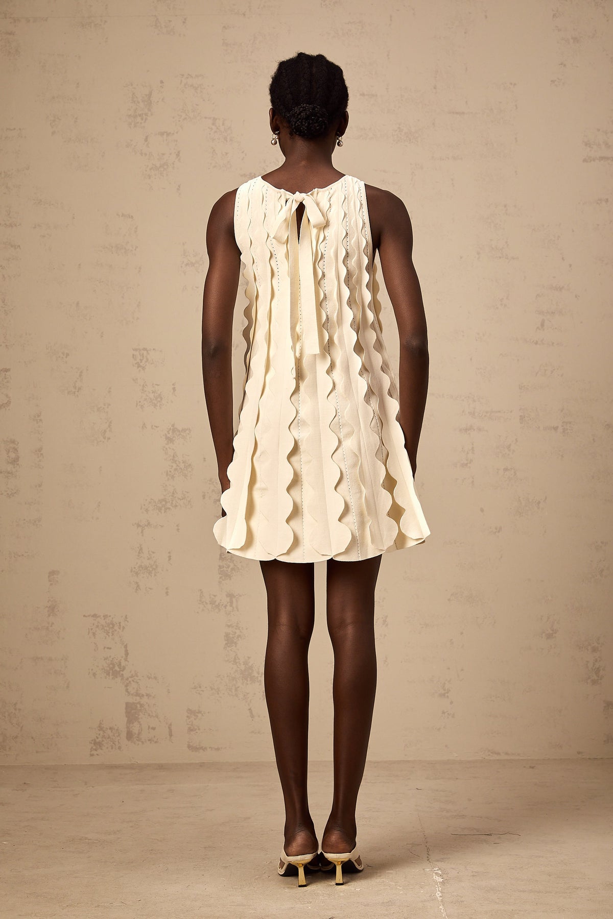 Axelle white wavy-detail sleeveless mini dress - White