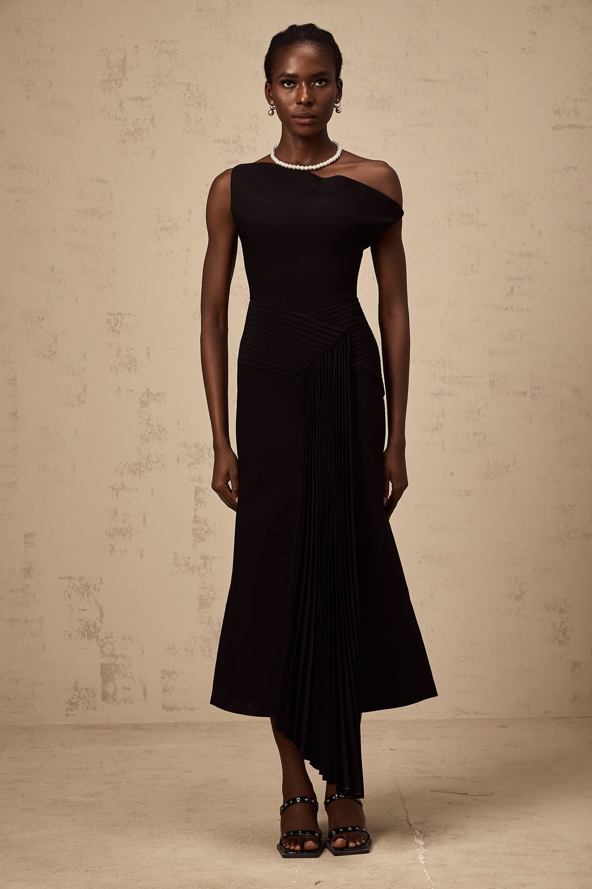 Laurine asymmetrical draped midi dress in Black