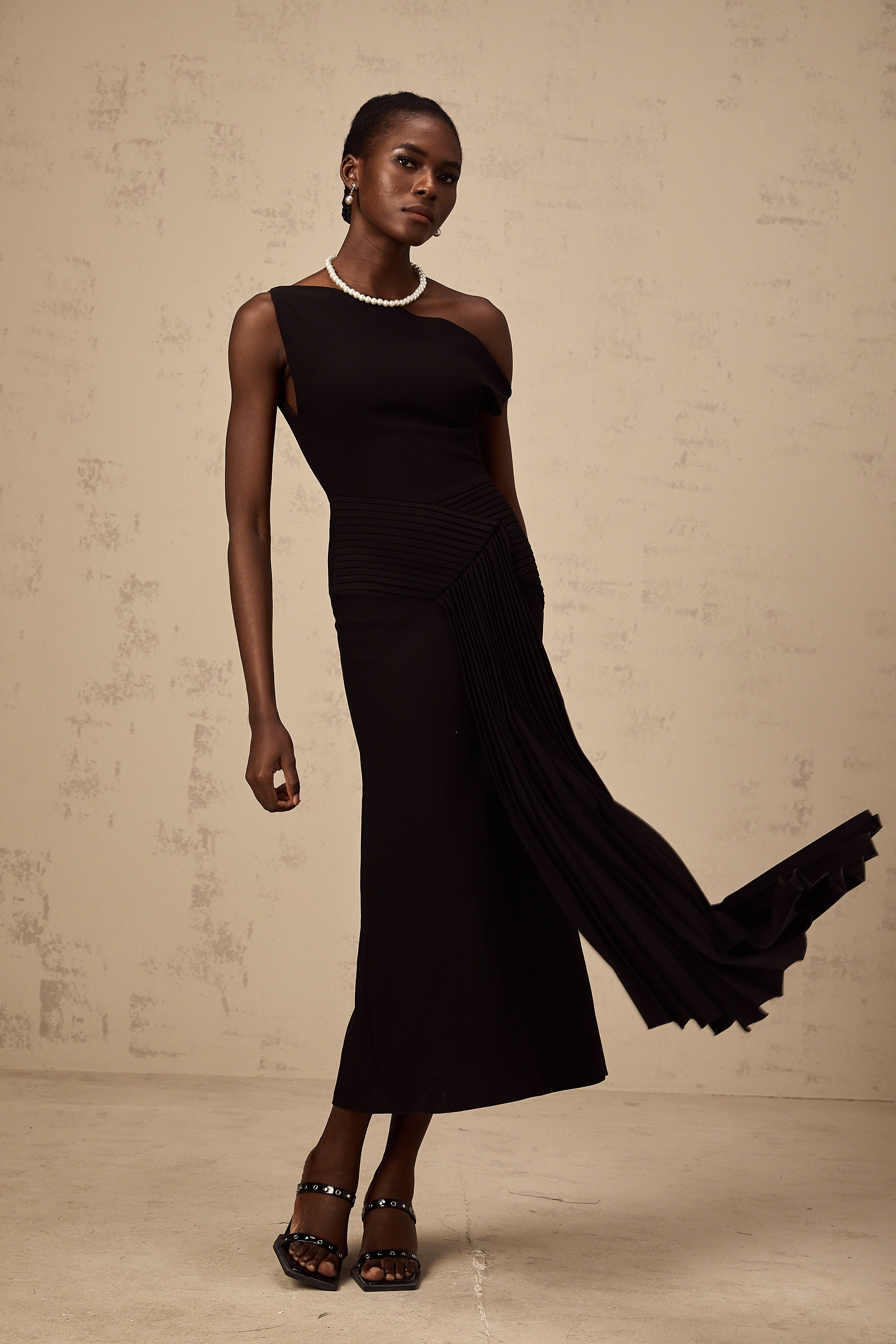 Laurine asymmetrical draped midi dress in Black
