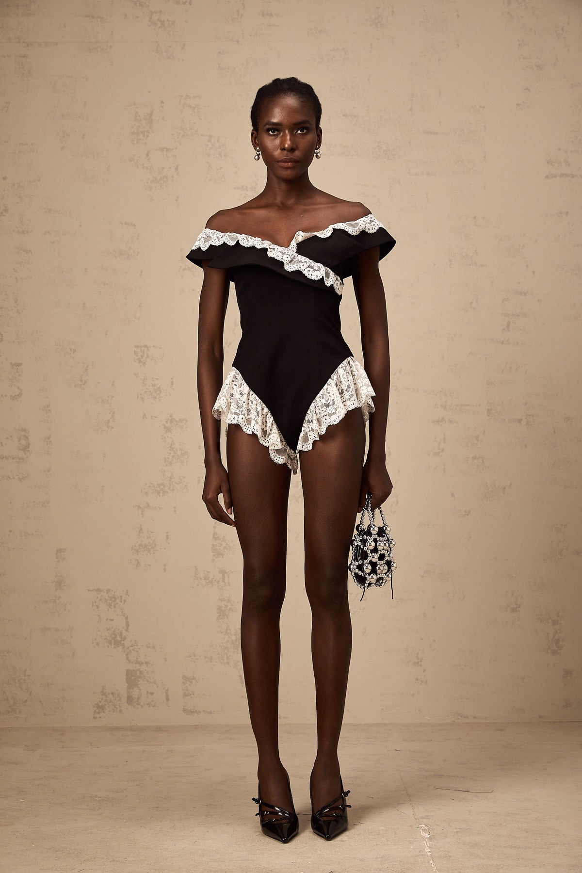 Karine black lace-trim bodysuit
