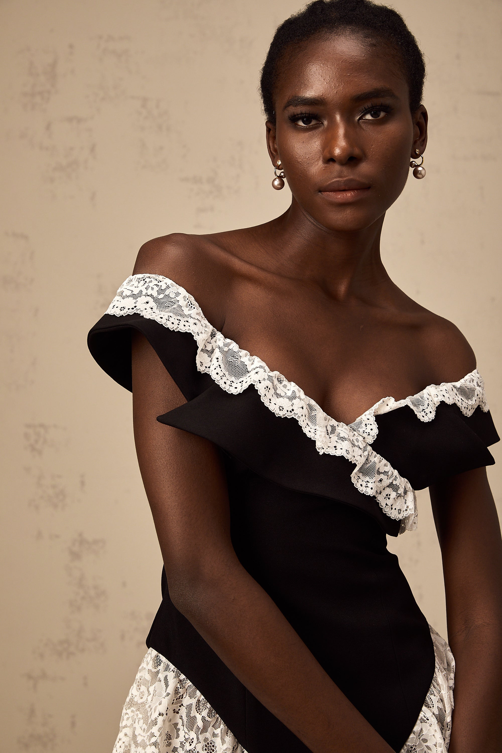Karine black lace-trim bodysuit