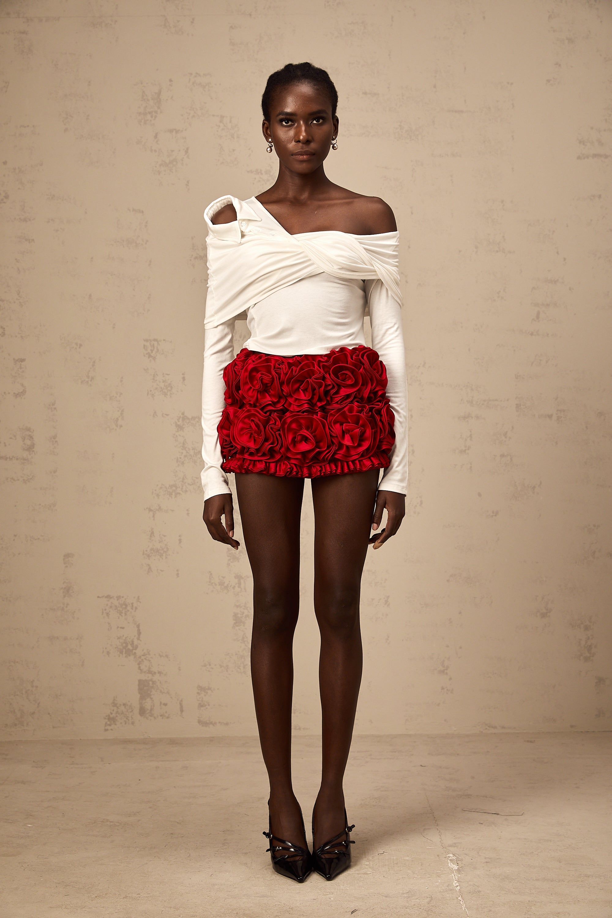 Zoéline white asymmetrical twisted jersey top