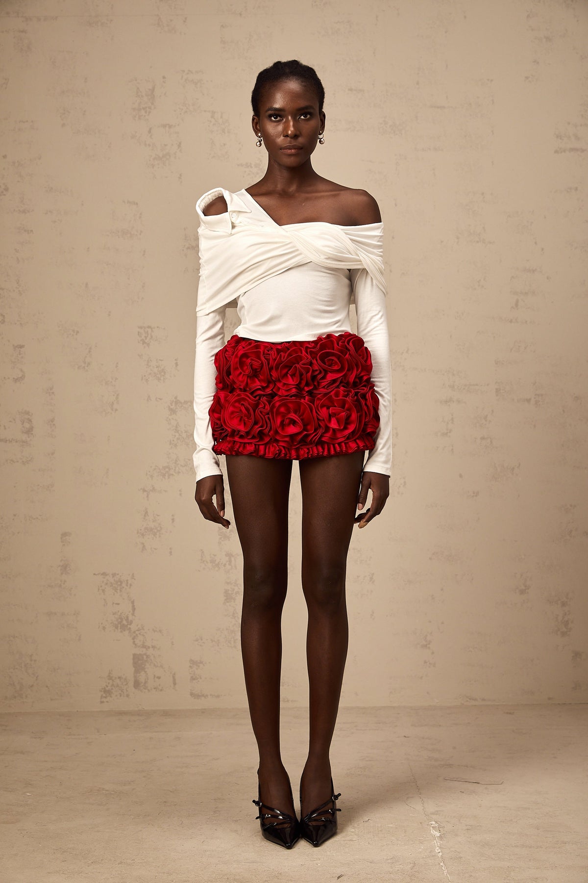 Zoéline white asymmetrical twisted jersey top