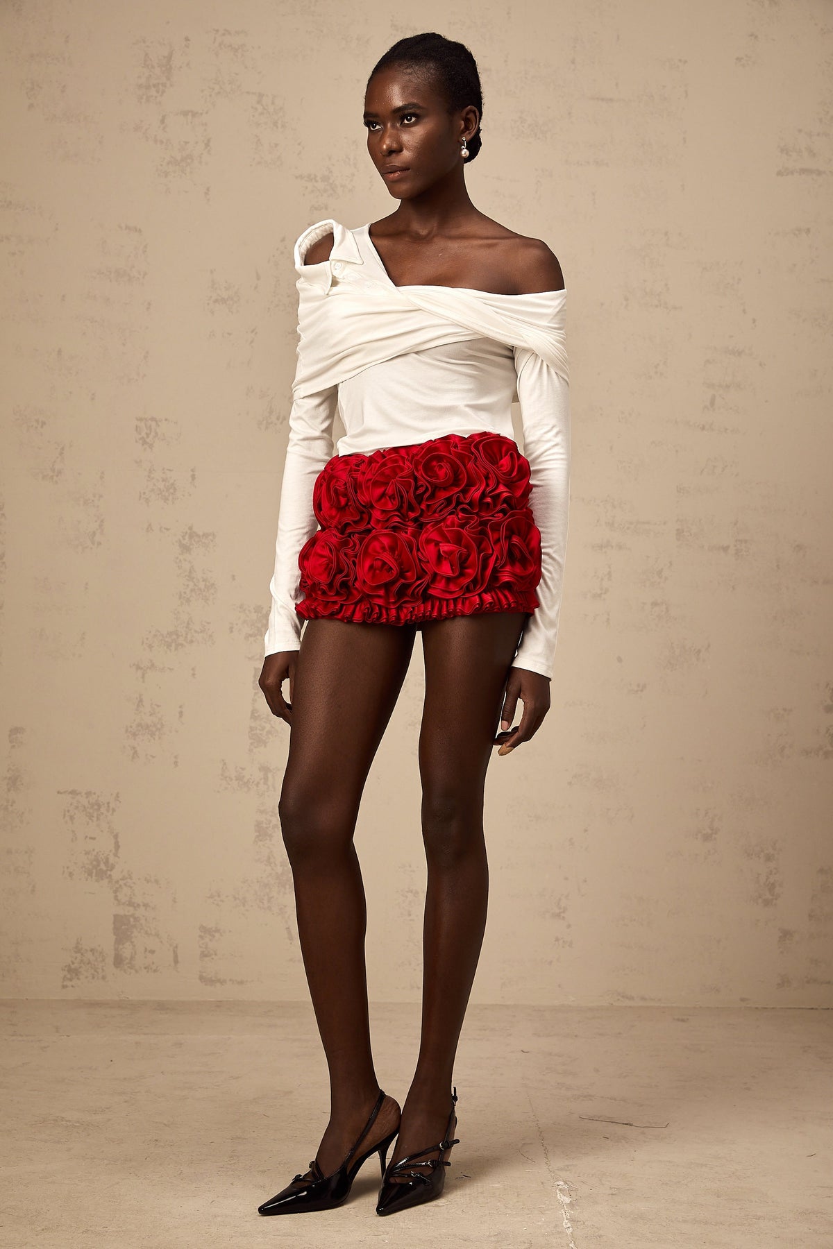 Zoéline white asymmetrical twisted jersey top