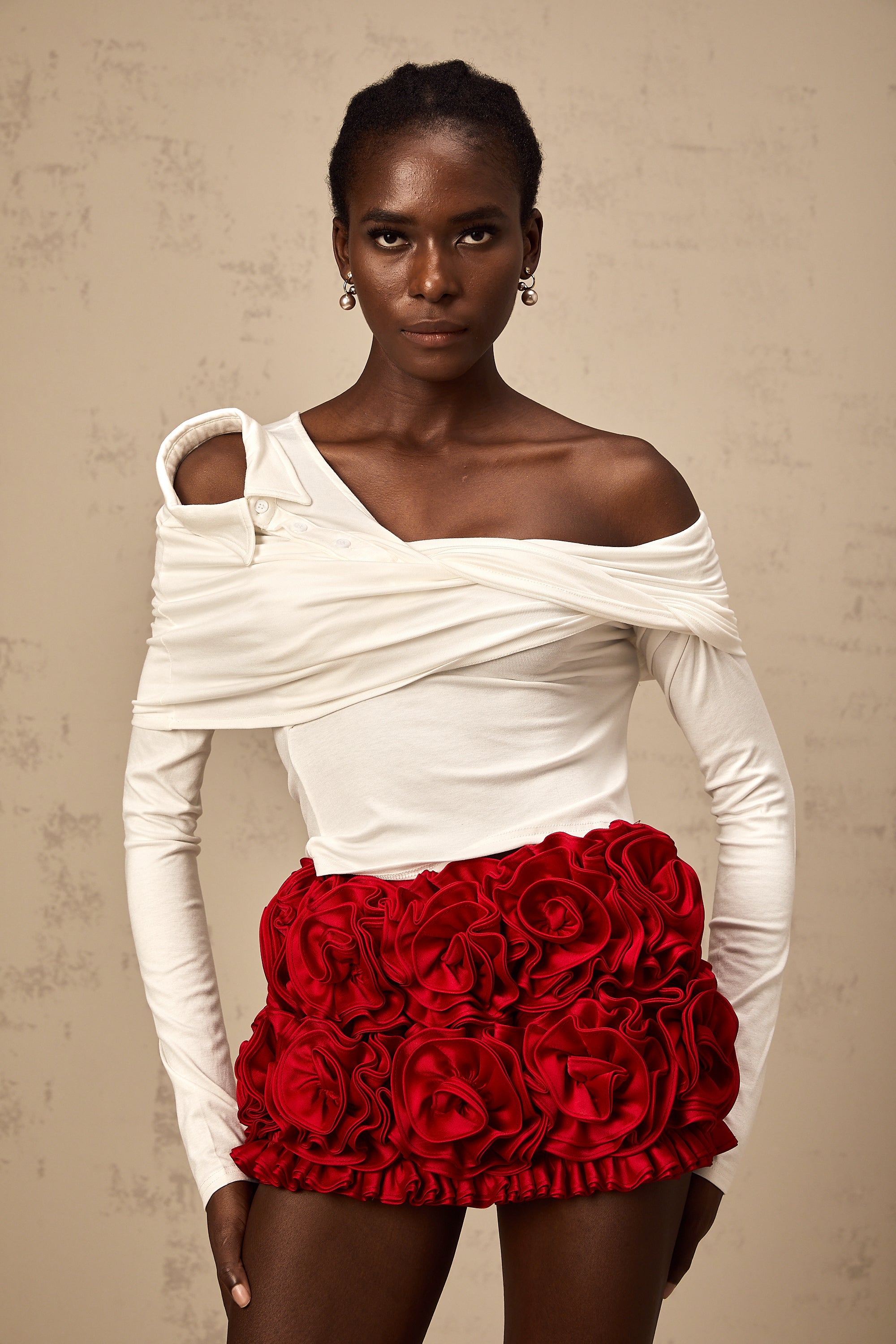 Zoéline white asymmetrical twisted jersey top