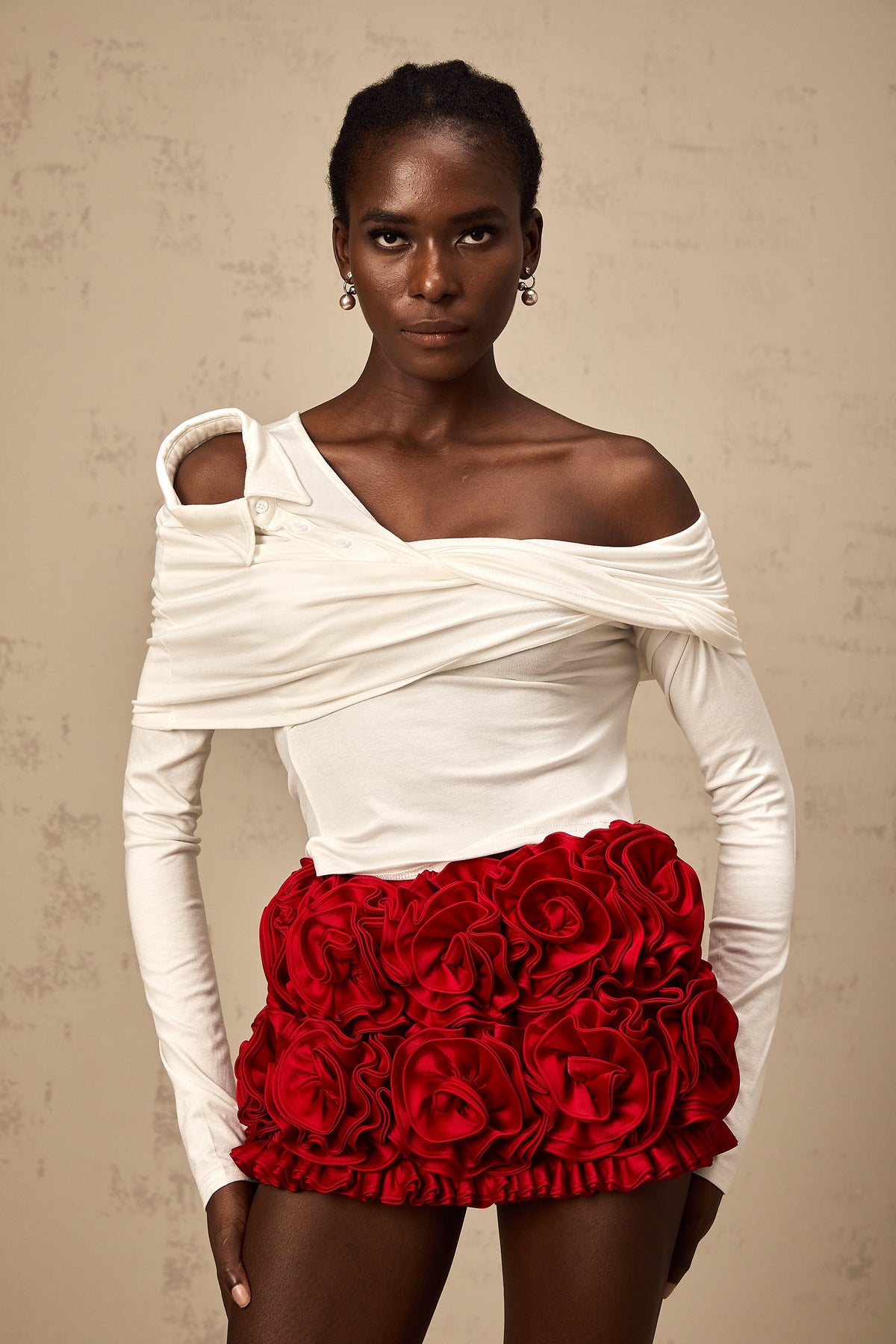 Zoéline white asymmetrical twisted jersey top
