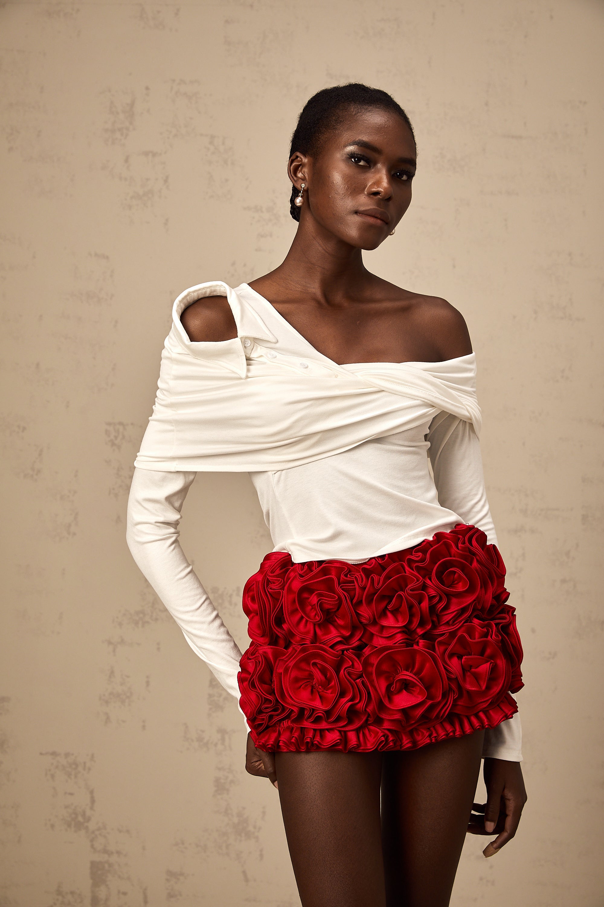 Zoéline white asymmetrical twisted jersey top
