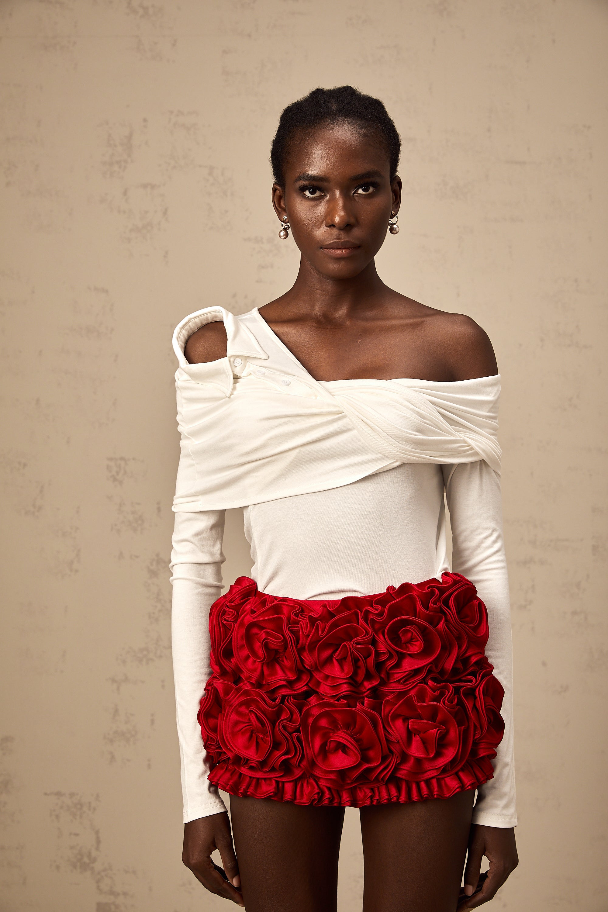 Zoéline white asymmetrical twisted jersey top