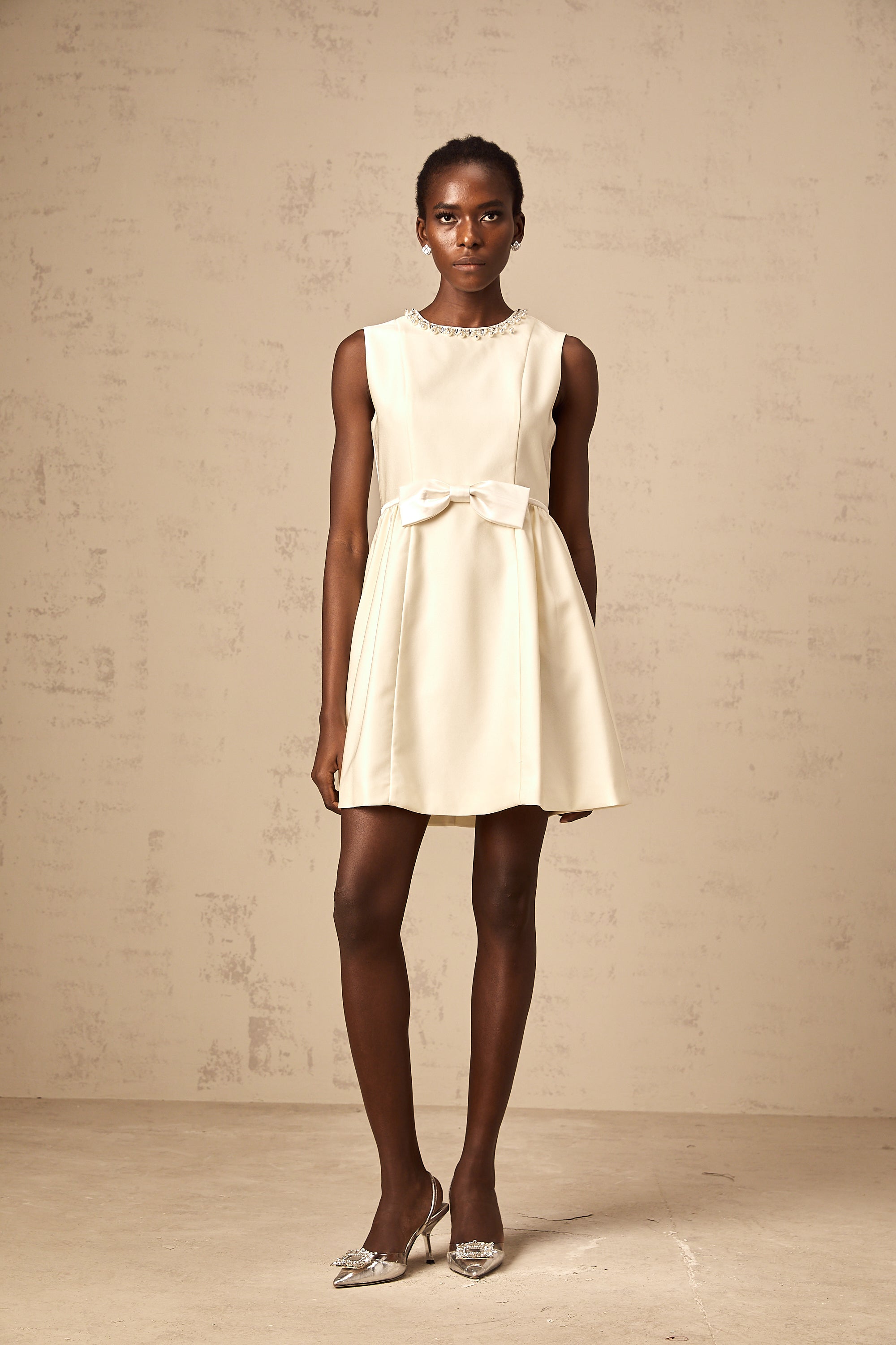 Isabelle white bowknot embellished mini dress