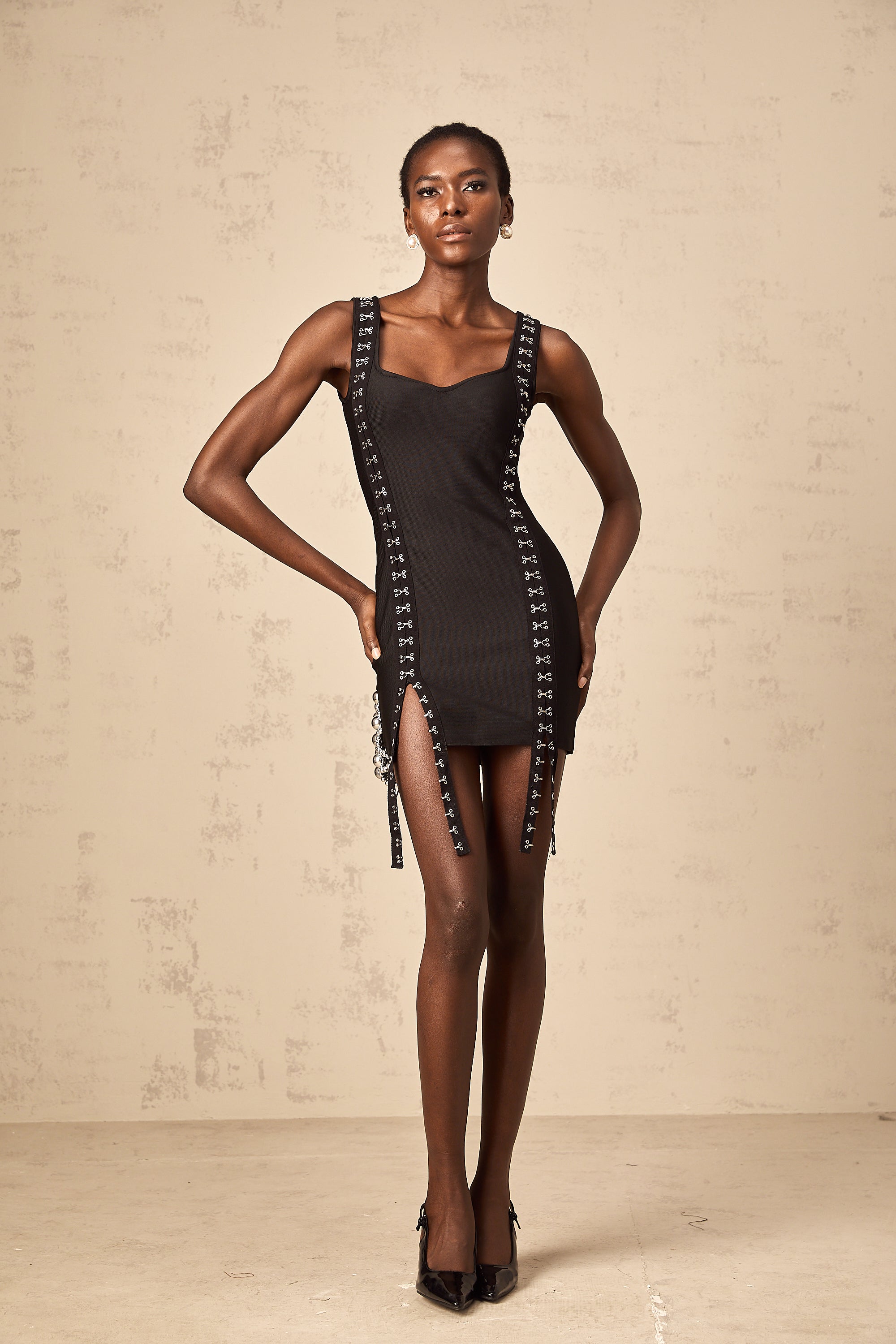 Irina black hook-and-eye bandage mini dress