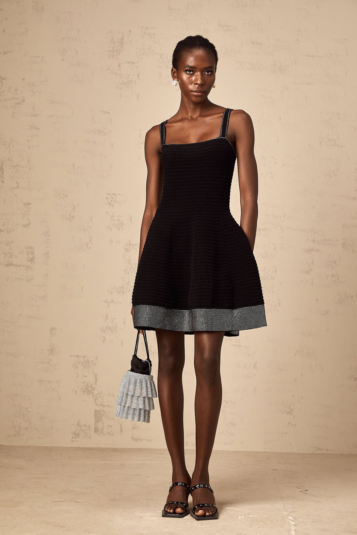 Éliane black studded flared knit mini dress