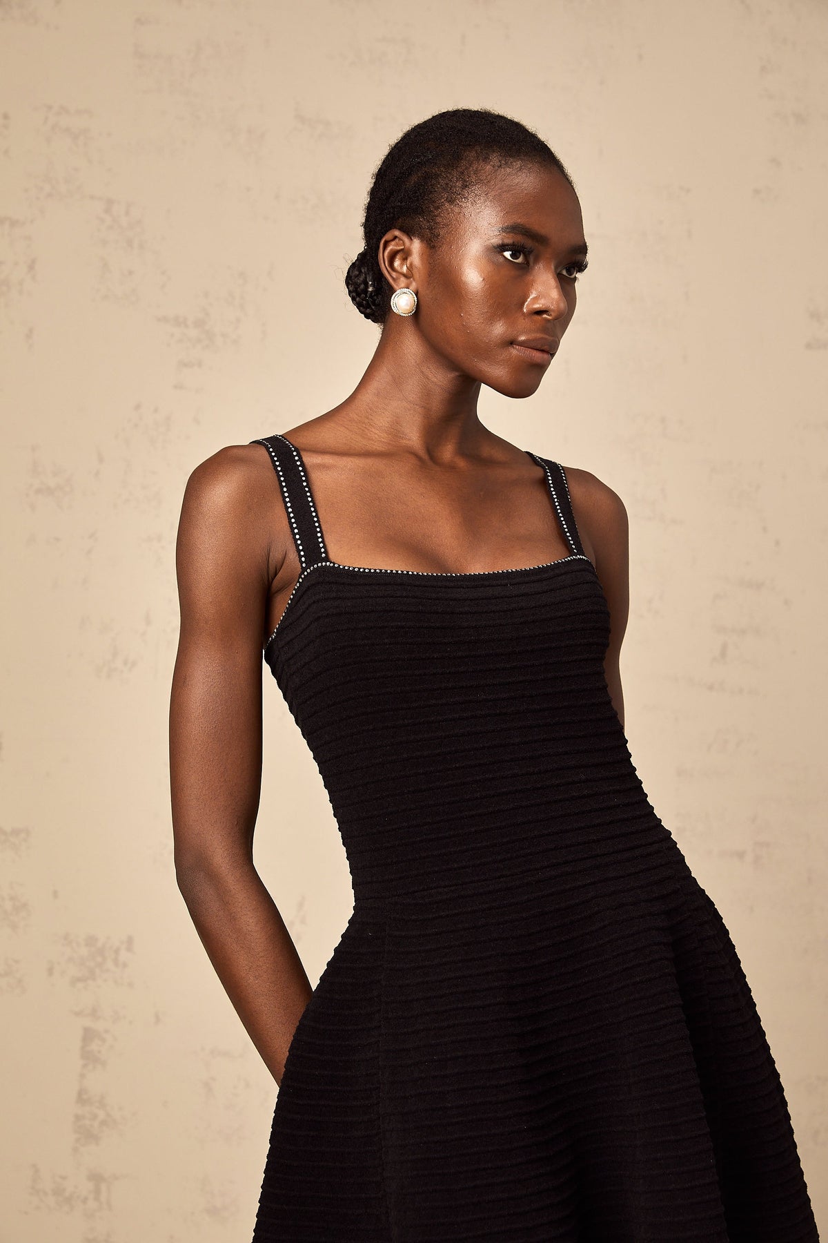 Éliane black studded flared knit mini dress
