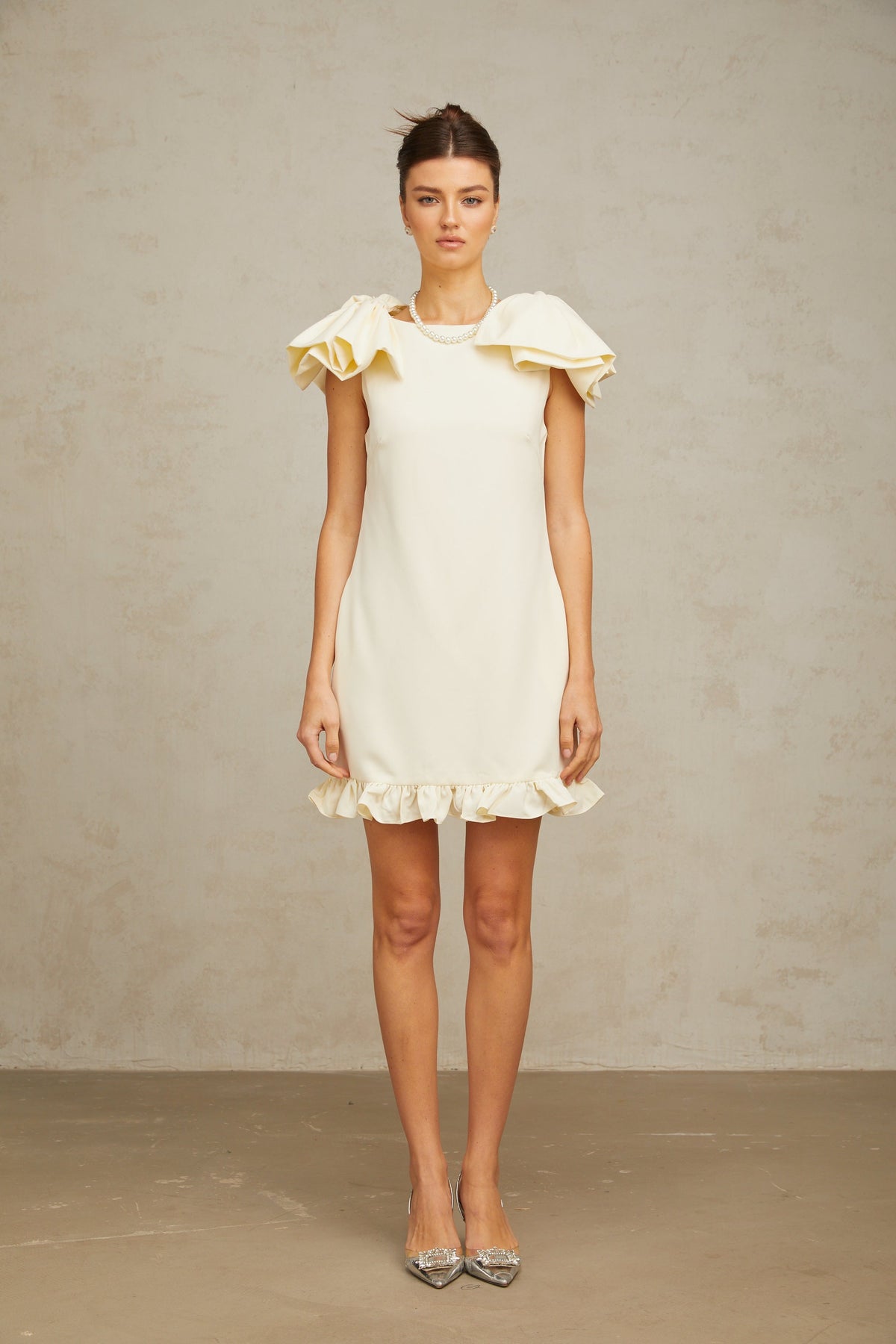 Constance white bow ruffled mini dress