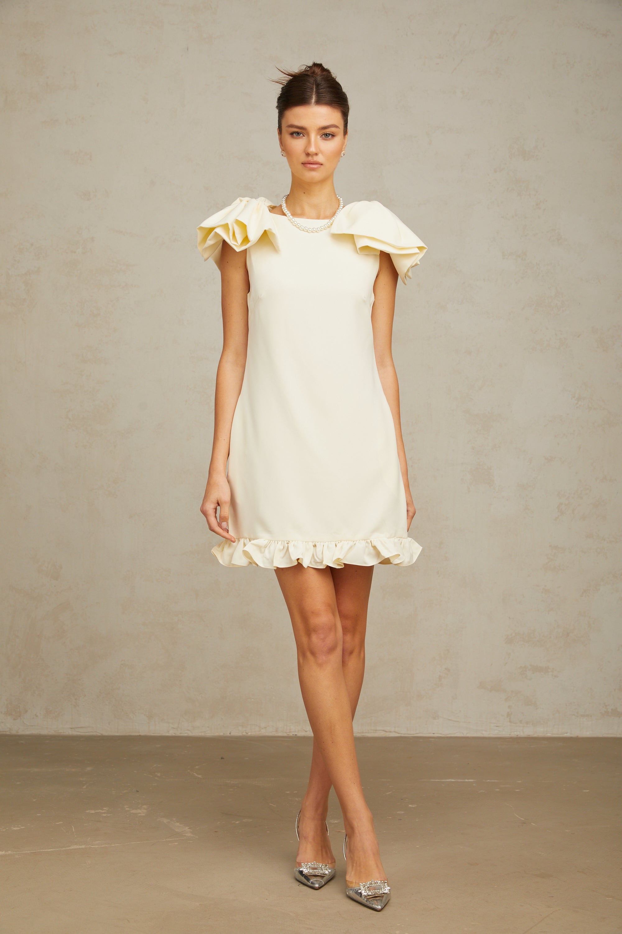 Constance white bow ruffled mini dress