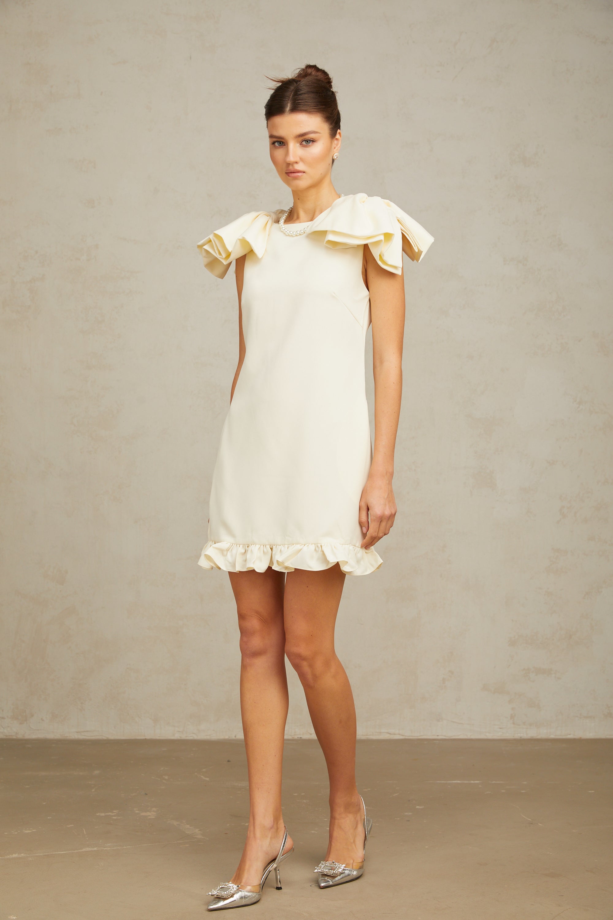 Constance white bow ruffled mini dress