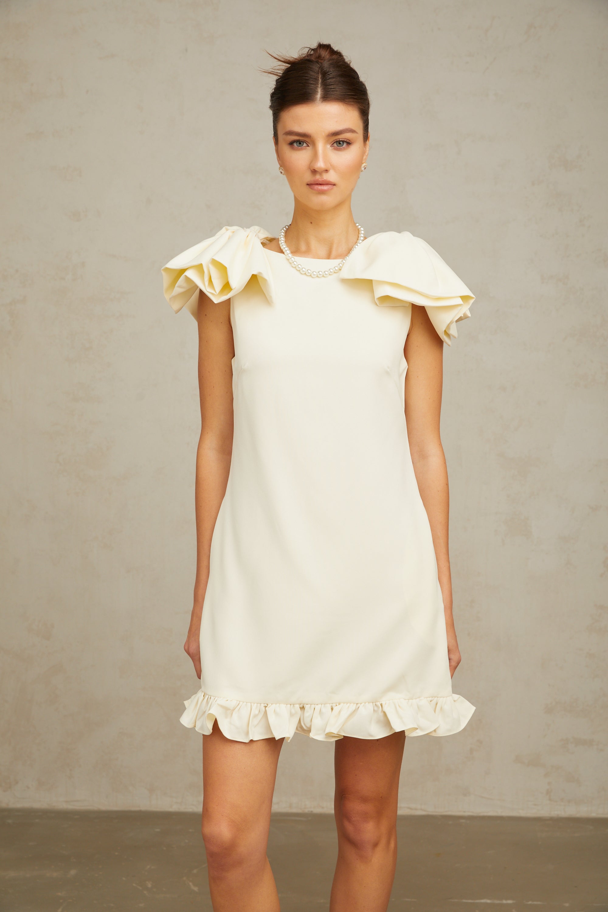 Constance white bow ruffled mini dress